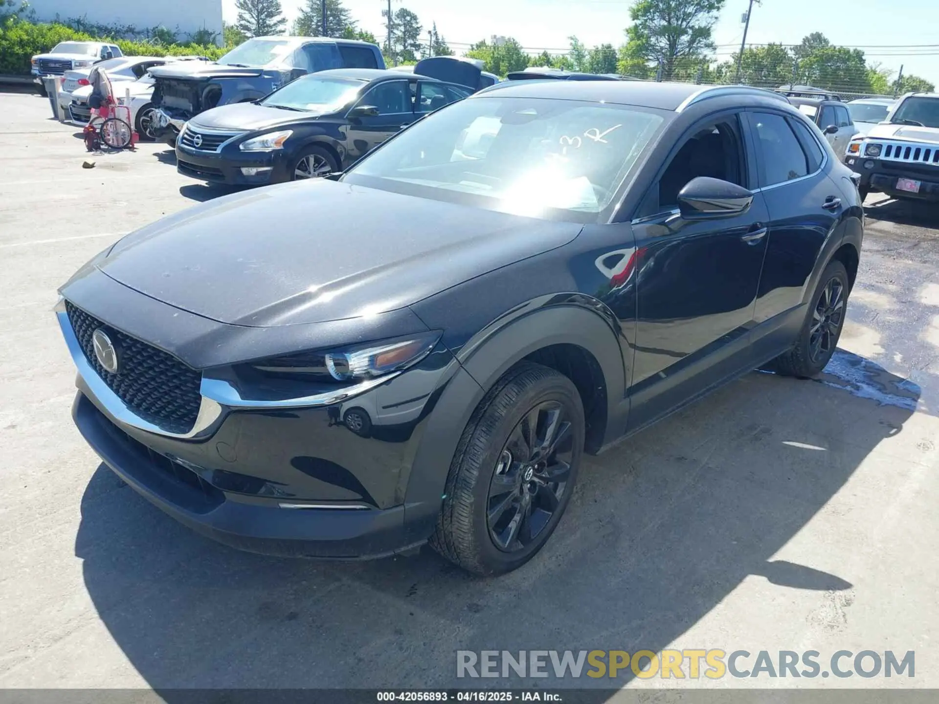 2 fotografías del automóvil dañado 3MVDMBBM2RM694278 MAZDA CX-30 2024