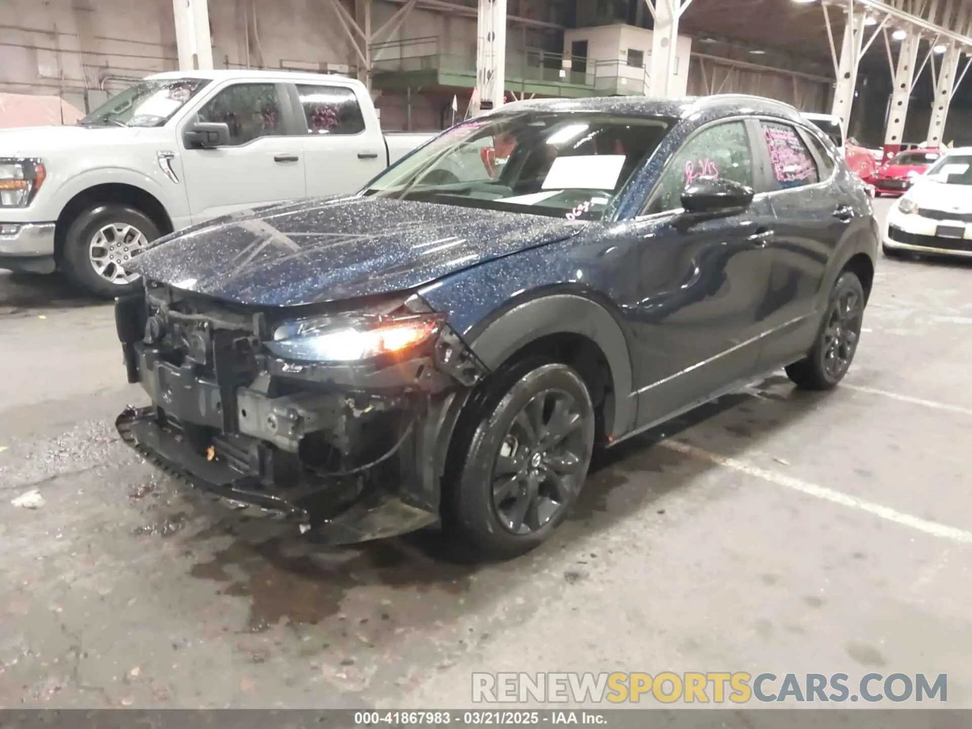 2 fotografías del automóvil dañado 3MVDMBBM3RM654887 MAZDA CX-30 2024