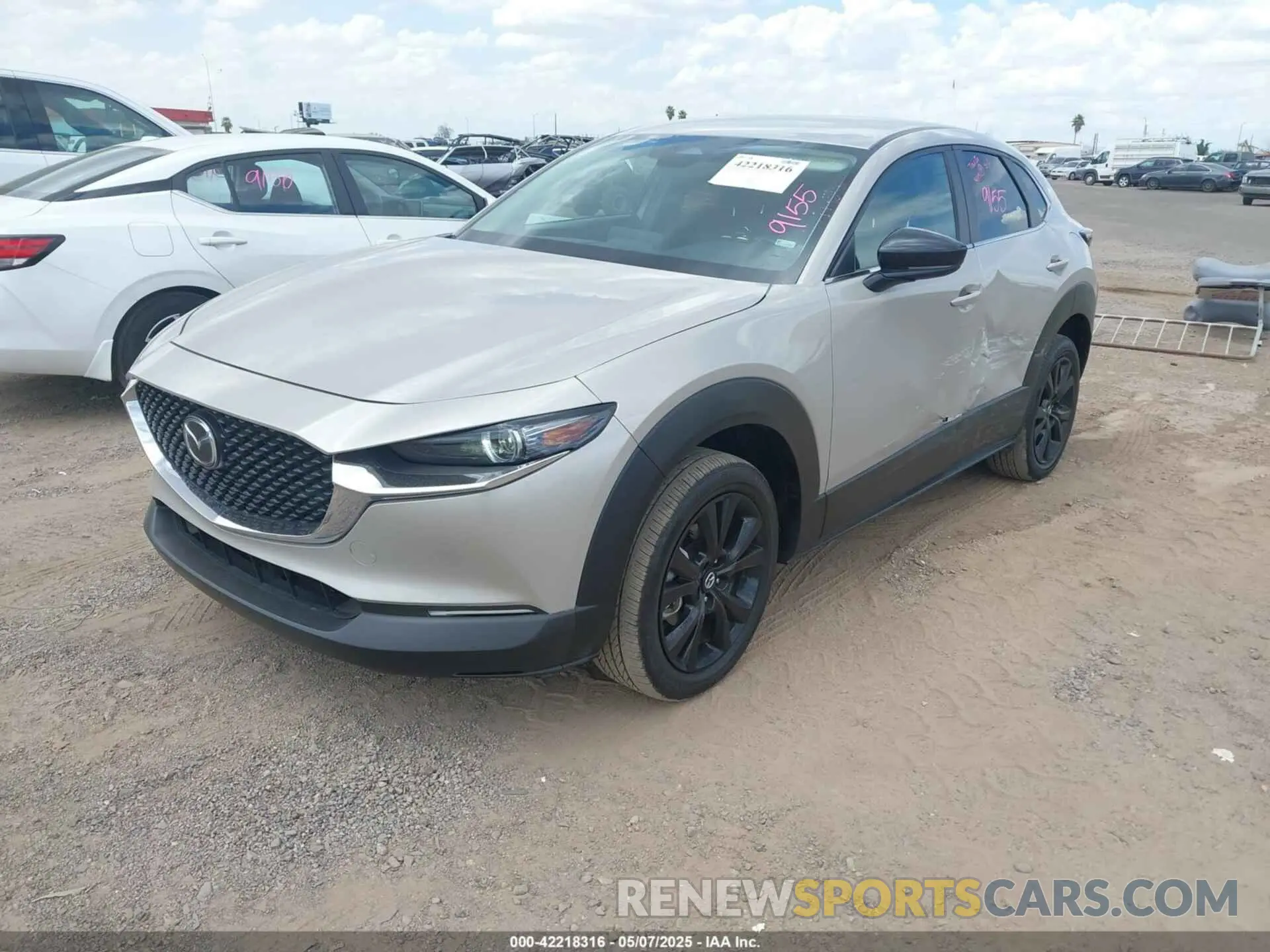2 fotografías del automóvil dañado 3MVDMBBM3RM657918 MAZDA CX-30 2024