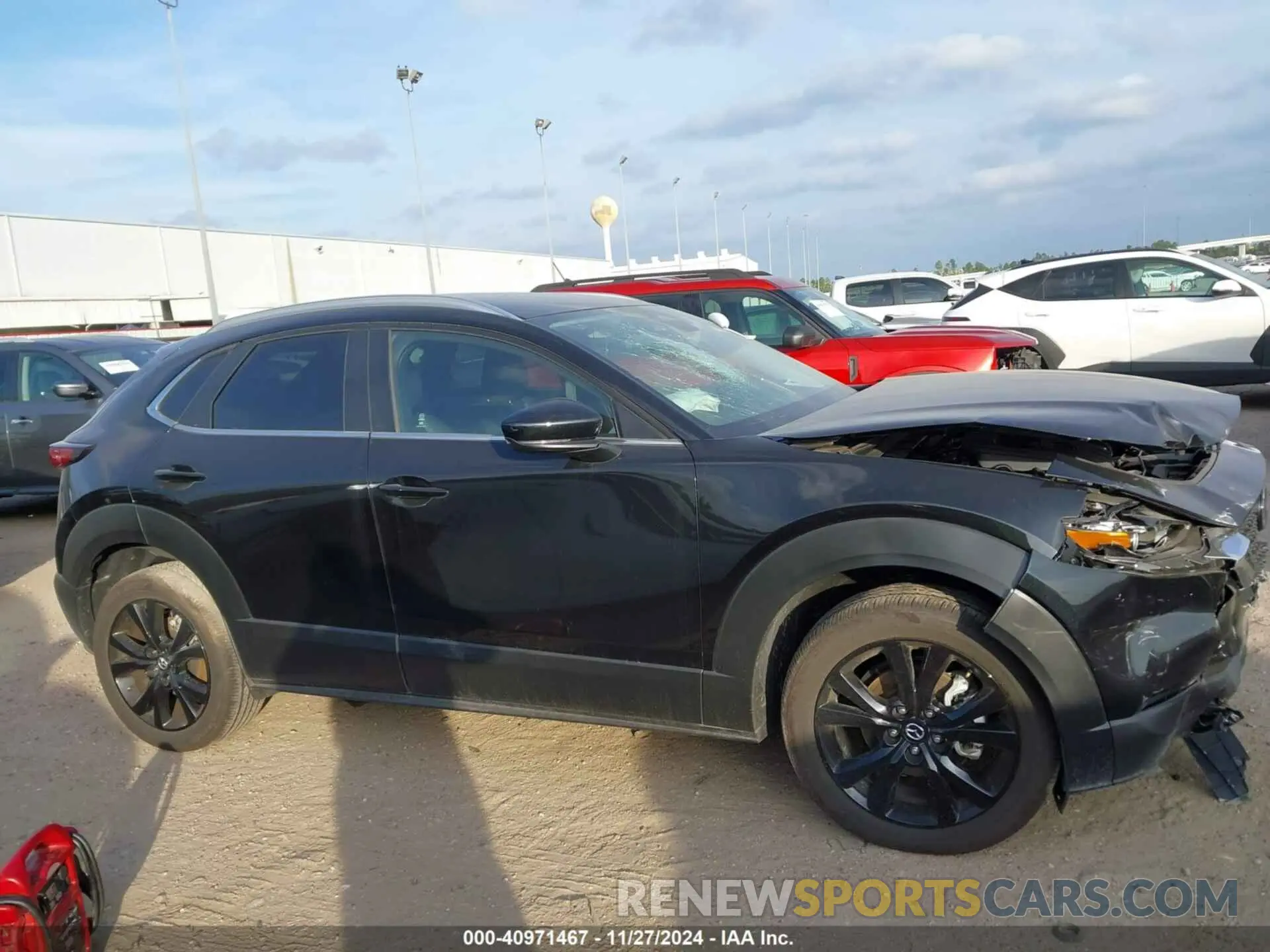 13 fotografías del automóvil dañado 3MVDMBBM5RM700297 MAZDA CX-30 2024