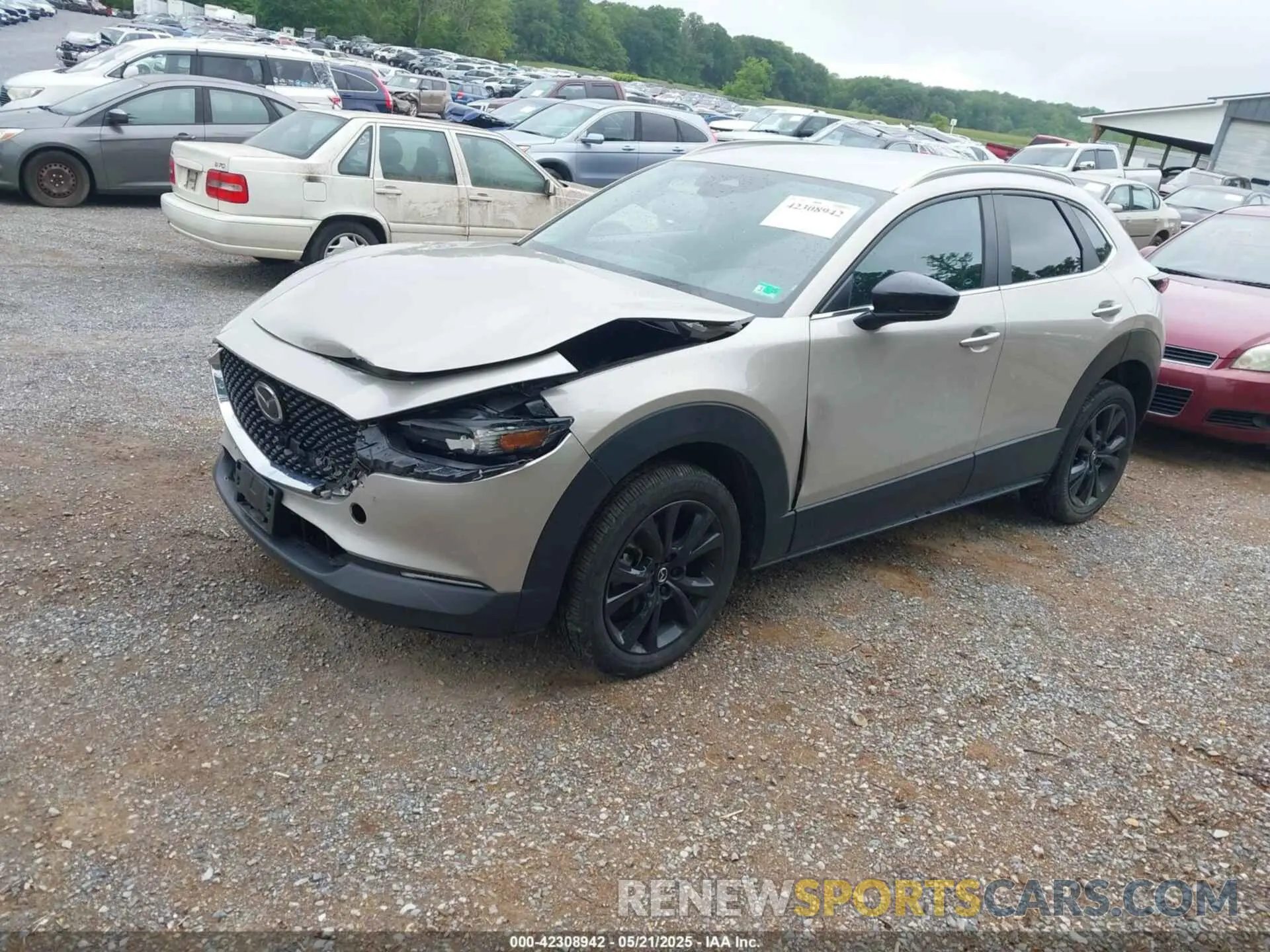 2 fotografías del automóvil dañado 3MVDMBBM6RM618305 MAZDA CX-30 2024