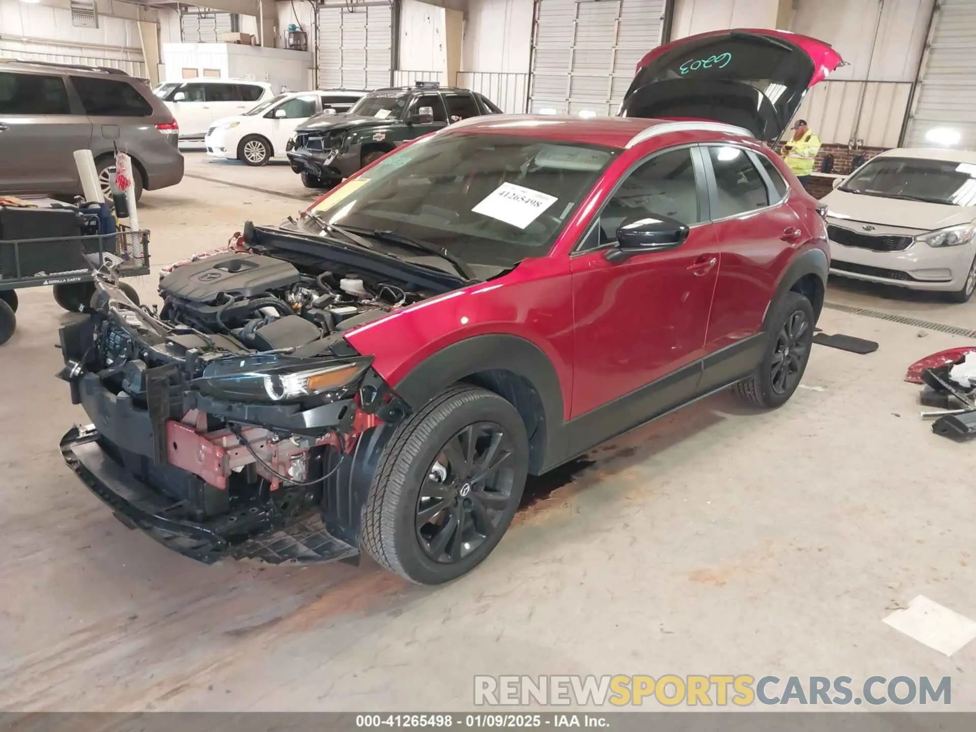 2 fotografías del automóvil dañado 3MVDMBBM7RM610746 MAZDA CX-30 2024