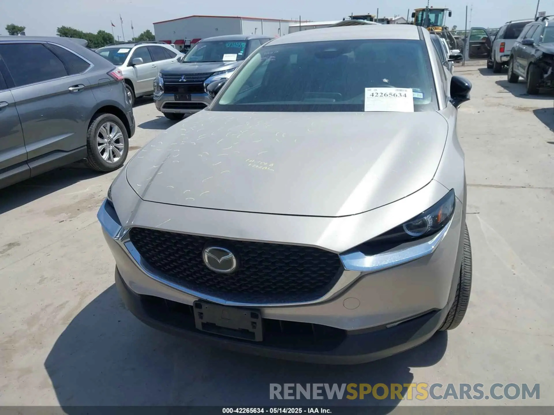12 fotografías del automóvil dañado 3MVDMBBM9RM664436 MAZDA CX-30 2024