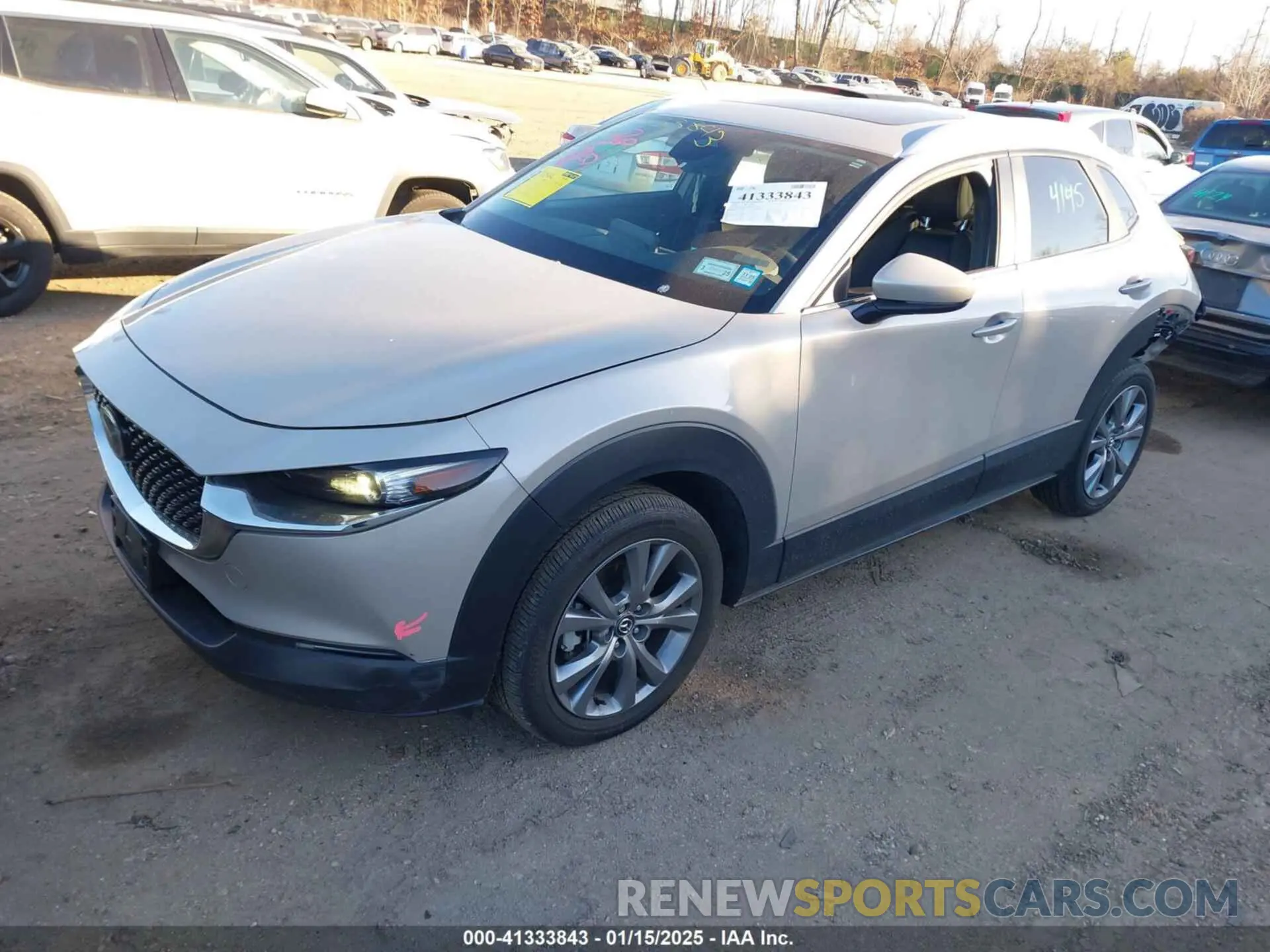 2 fotografías del automóvil dañado 3MVDMBCM4RM605387 MAZDA CX-30 2024