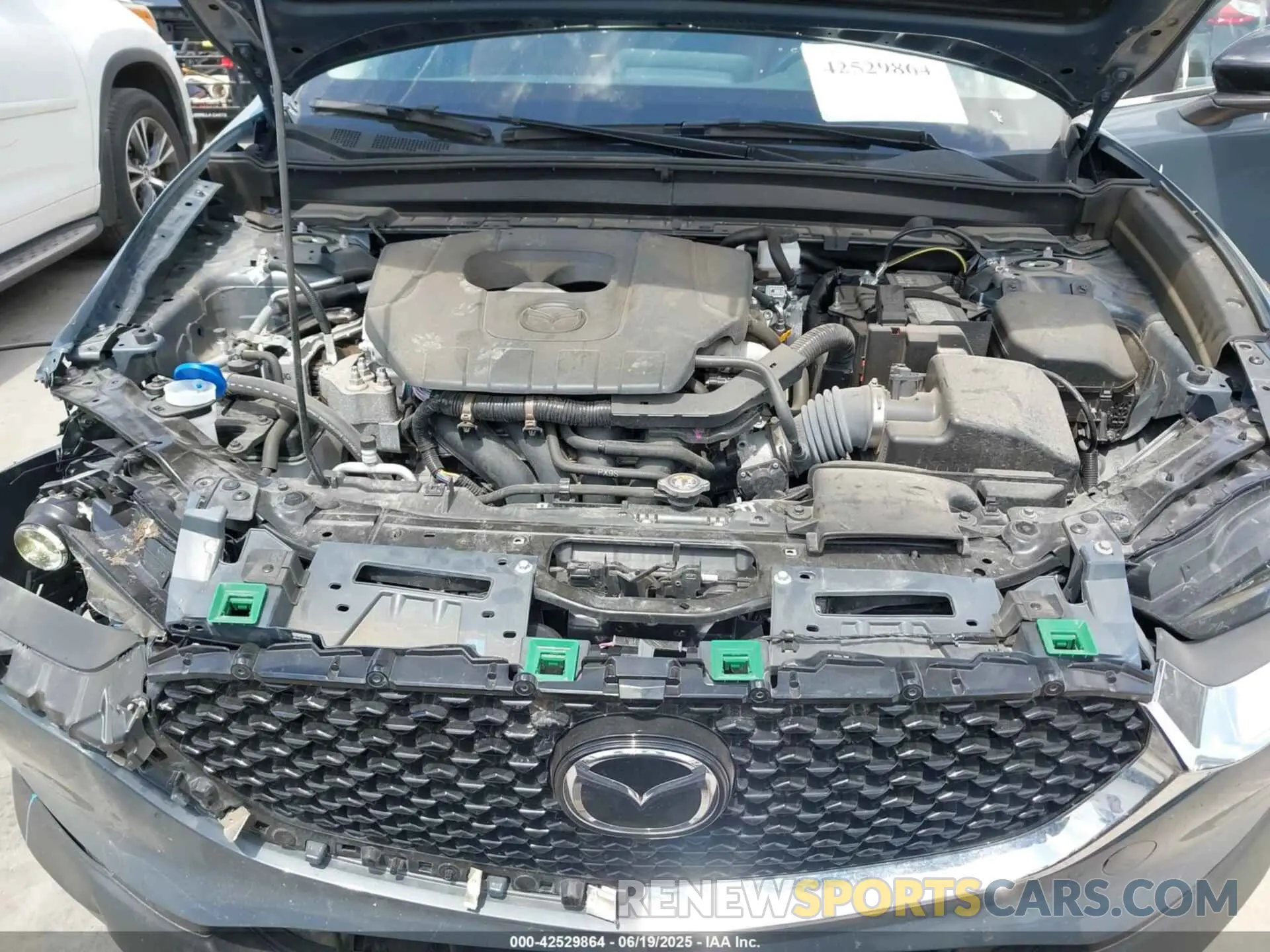 10 fotografías del automóvil dañado 3MVDMBCM4RM651155 MAZDA CX-30 2024