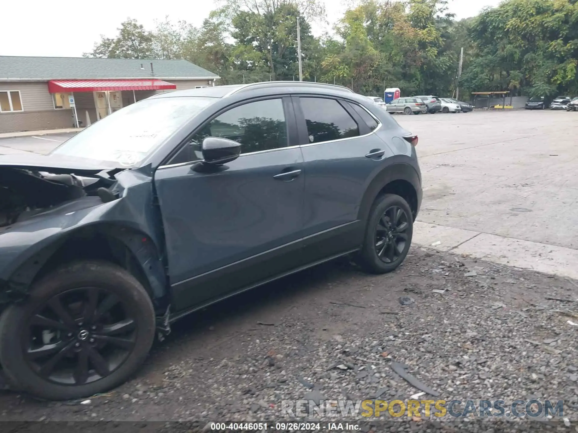 12 fotografías del automóvil dañado 3MVDMBCM6RM674193 MAZDA CX-30 2024