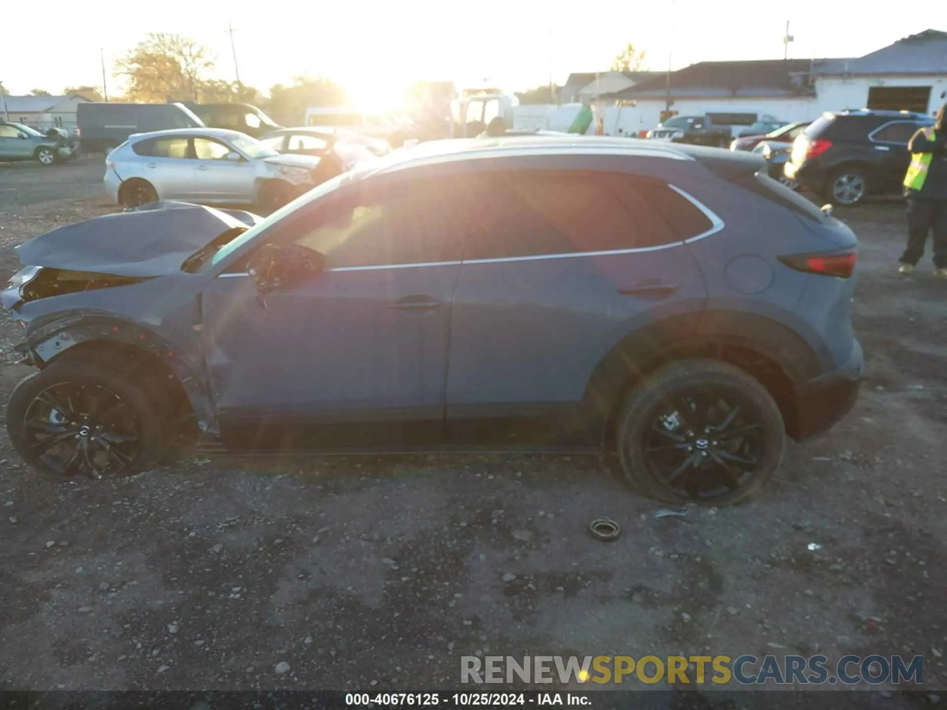 14 fotografías del automóvil dañado 3MVDMBCM6RM677210 MAZDA CX-30 2024