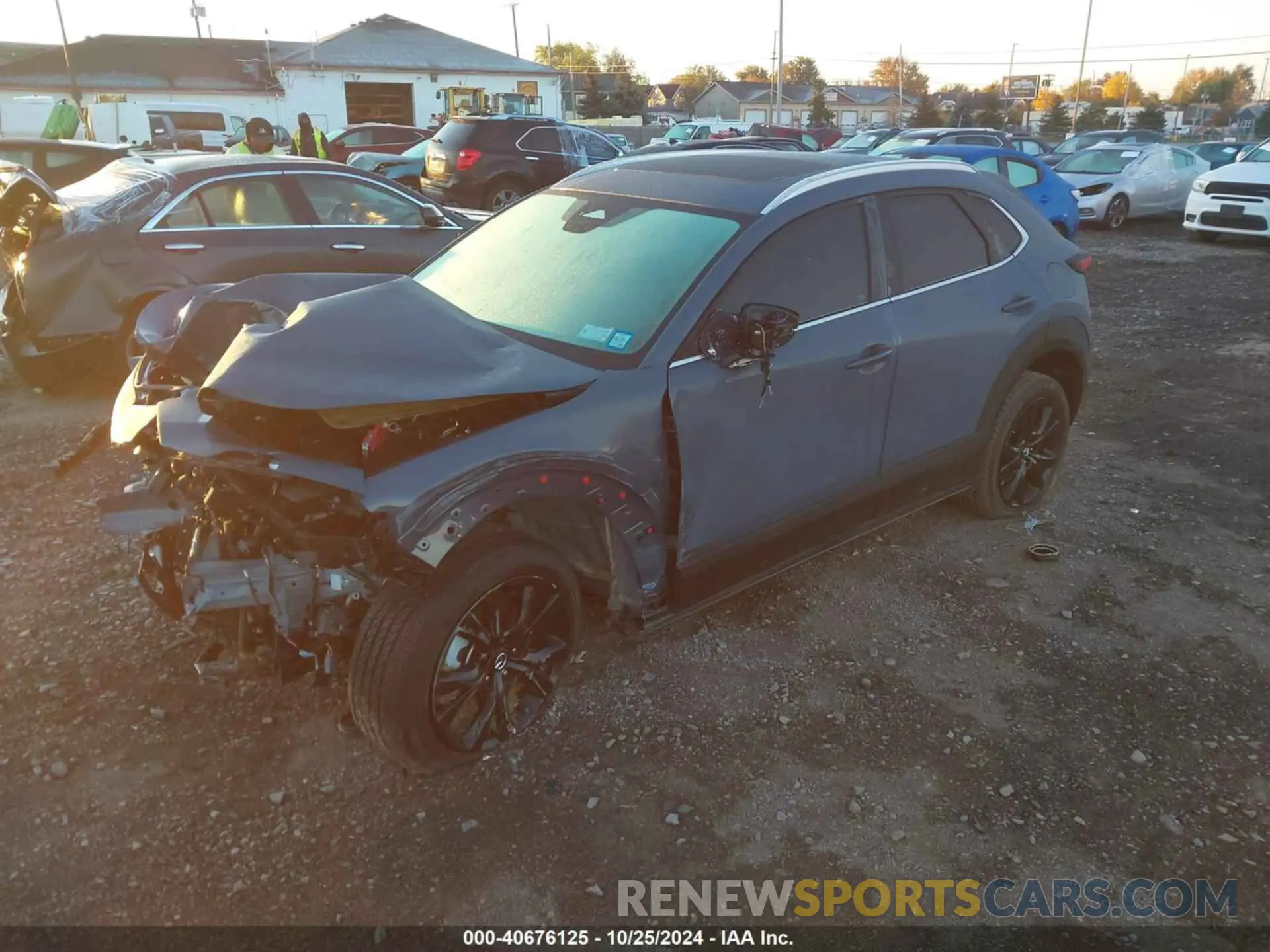 2 fotografías del automóvil dañado 3MVDMBCM6RM677210 MAZDA CX-30 2024