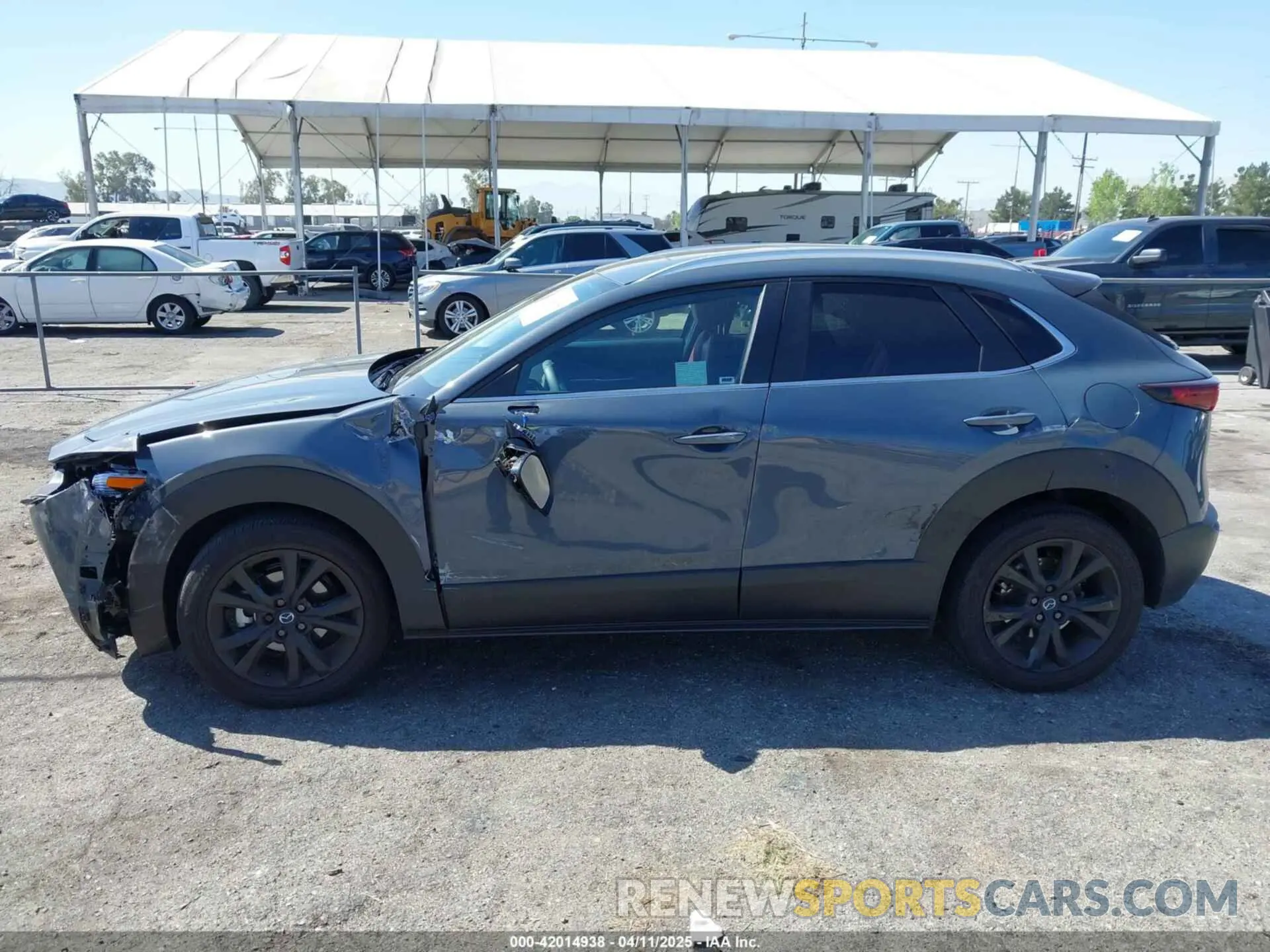 14 fotografías del automóvil dañado 3MVDMBCM6RM721139 MAZDA CX-30 2024
