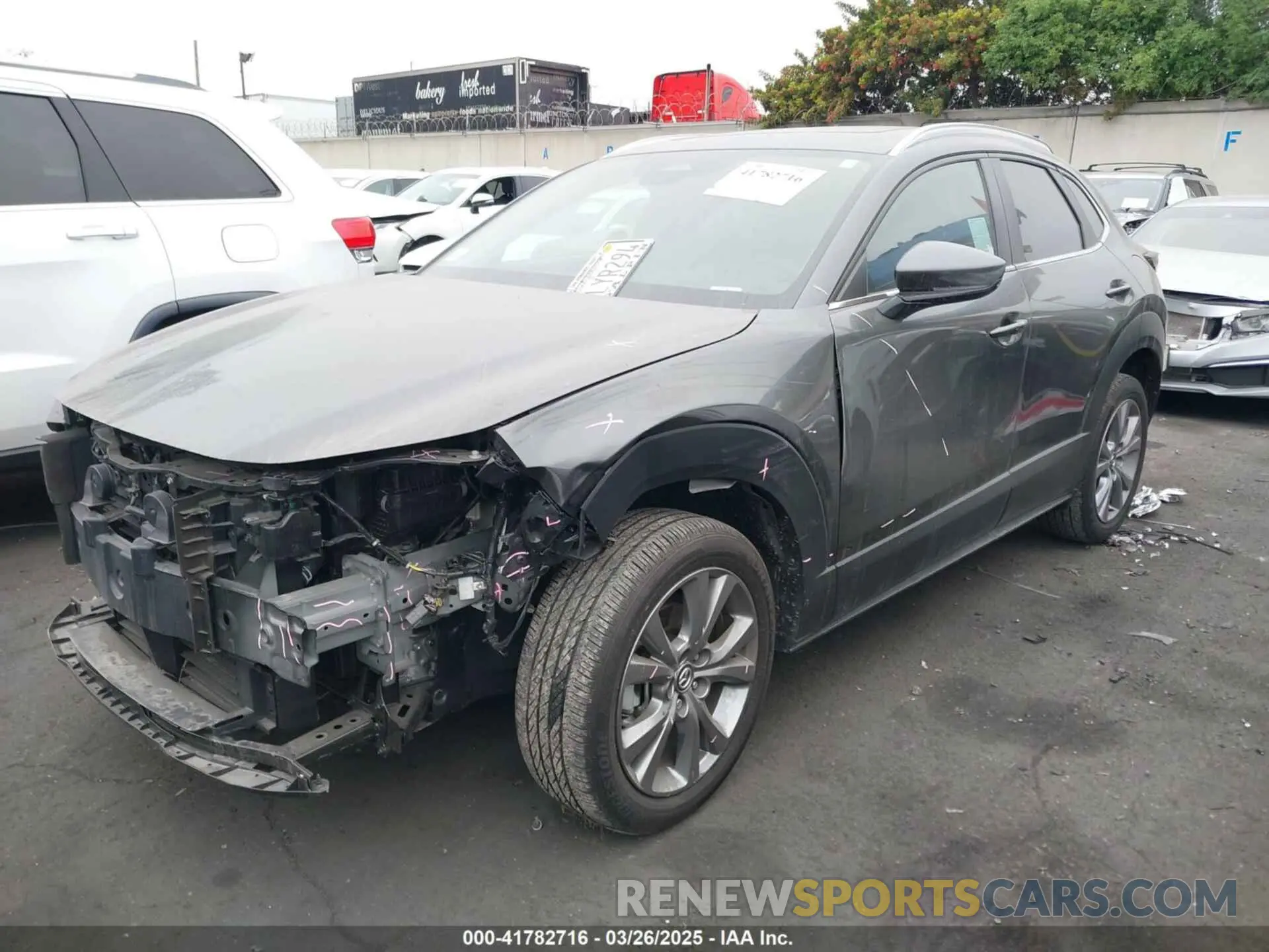 2 fotografías del automóvil dañado 3MVDMBCM9RM636876 MAZDA CX-30 2024
