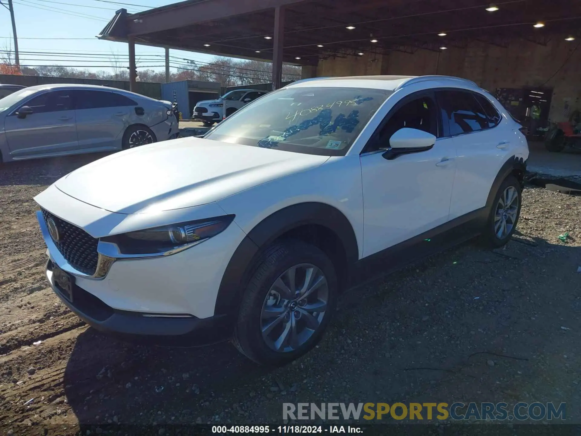2 fotografías del automóvil dañado 3MVDMBDM0RM657503 MAZDA CX-30 2024