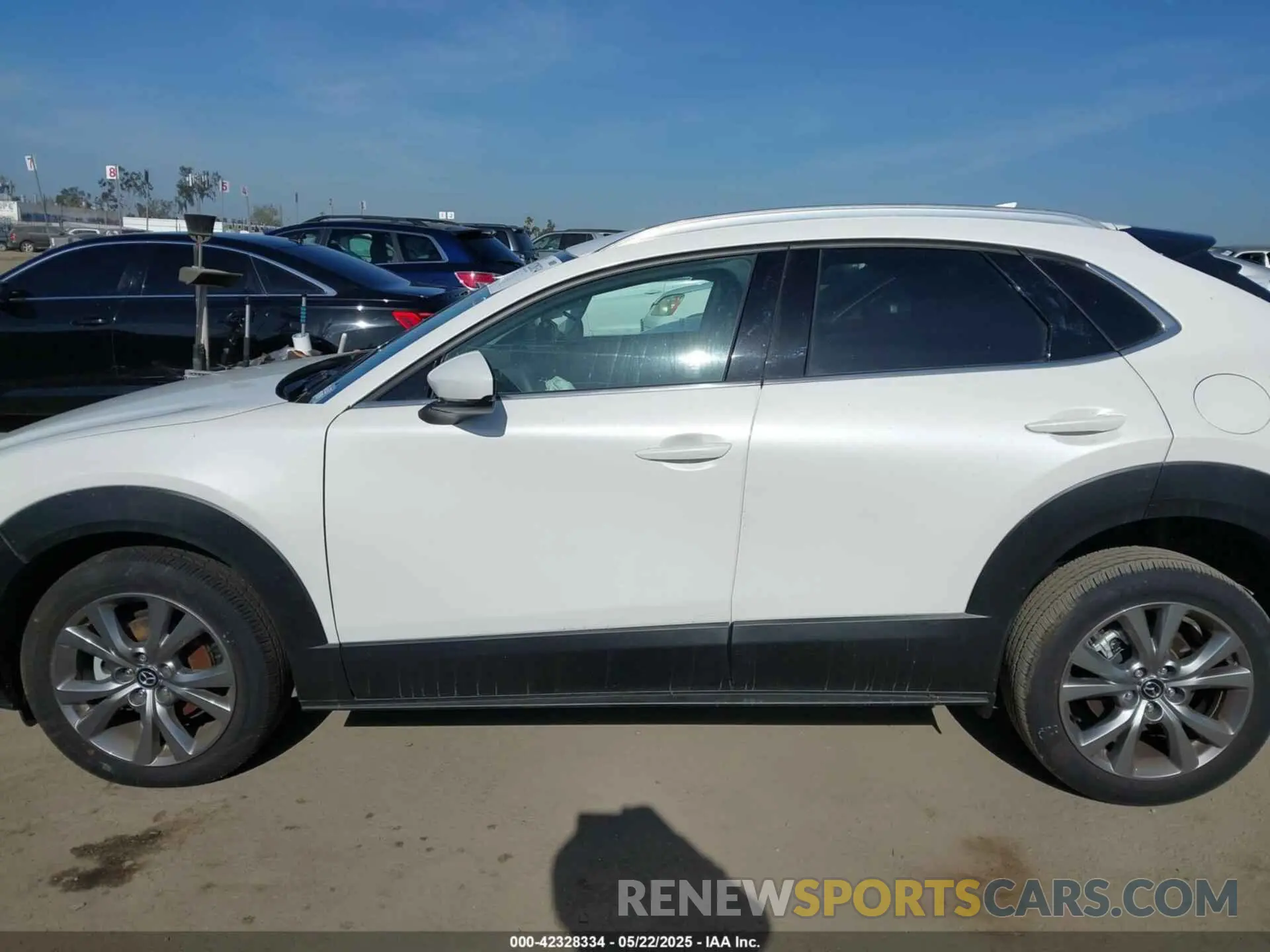 14 fotografías del automóvil dañado 3MVDMBDM4RM616159 MAZDA CX-30 2024