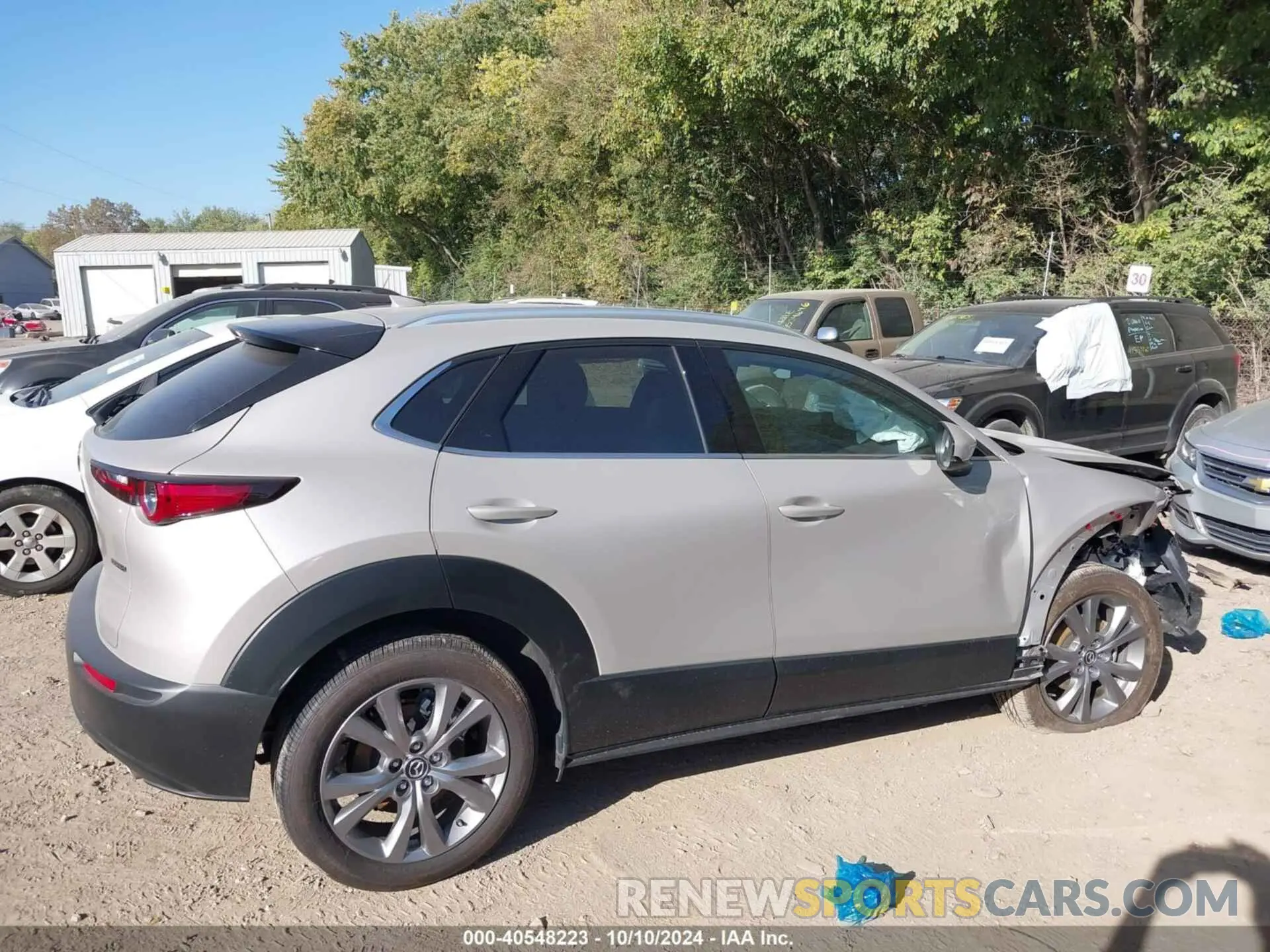 13 fotografías del automóvil dañado 3MVDMBDMXRM627652 MAZDA CX-30 2024