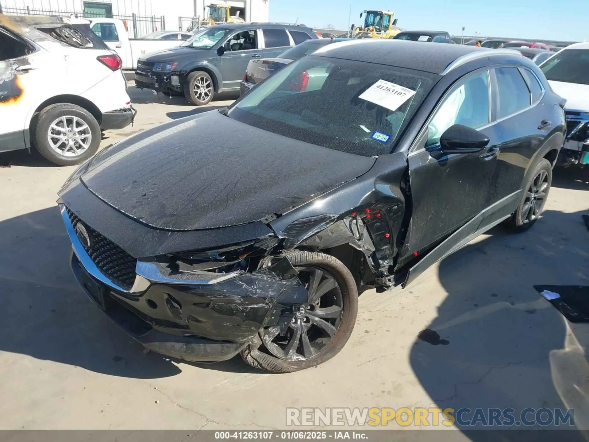 2 fotografías del automóvil dañado 3MVDMBBM0SM760087 MAZDA CX-30 2025