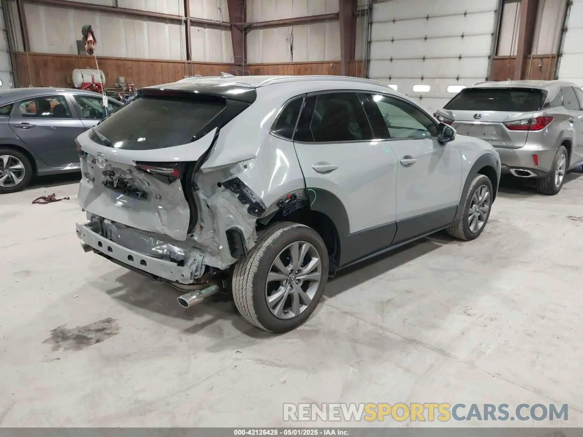 4 fotografías del automóvil dañado 3MVDMBDM5SM788786 MAZDA CX-30 2025