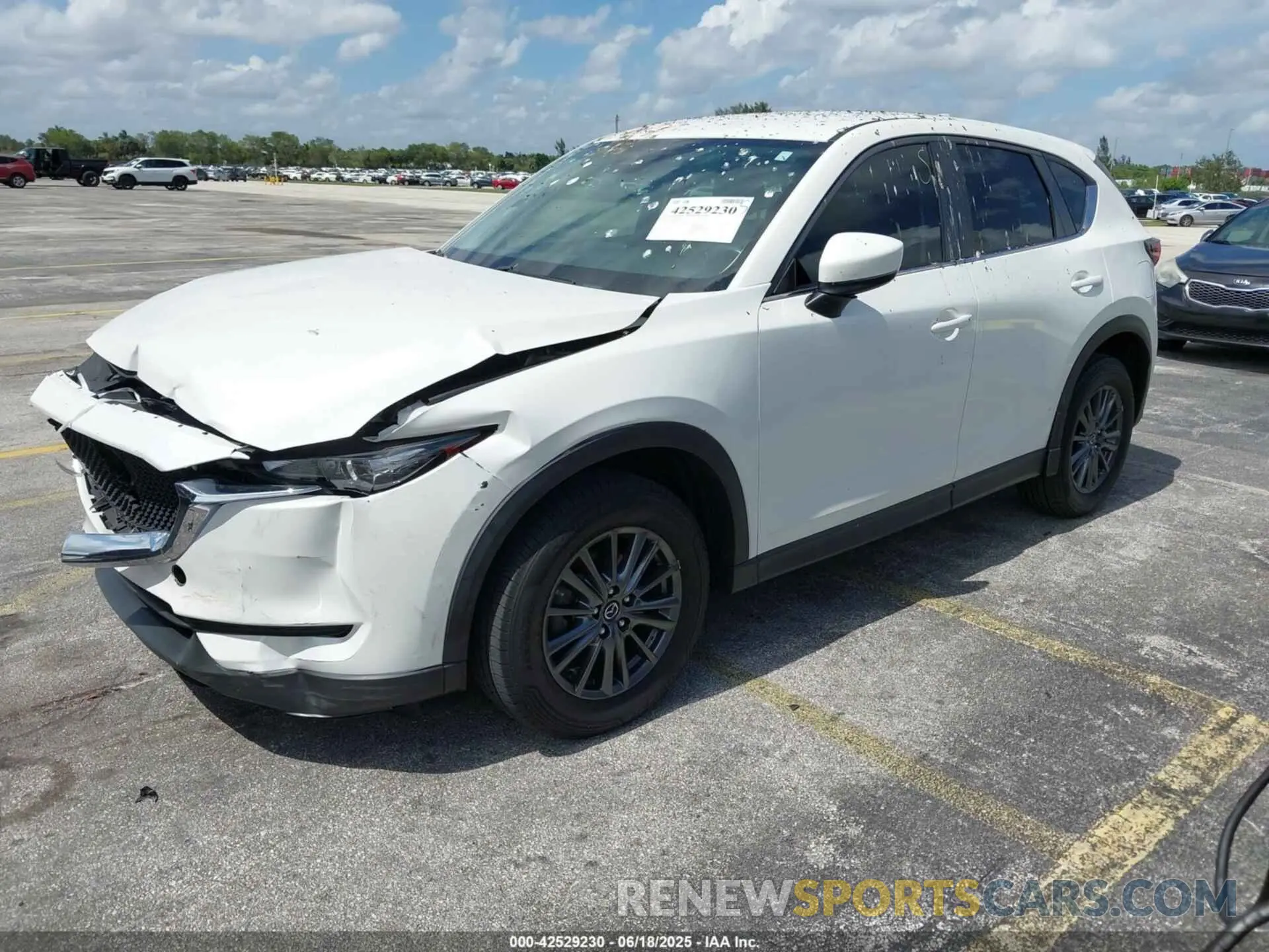 2 fotografías del automóvil dañado JM3KFABM3K0532947 MAZDA CX-5 2019