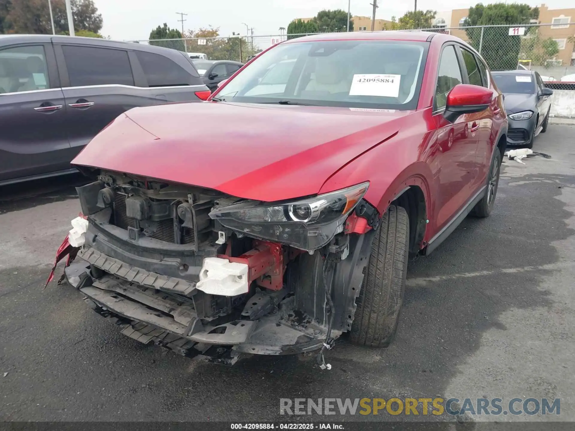 2 fotografías del automóvil dañado JM3KFACM0K0546819 MAZDA CX-5 2019