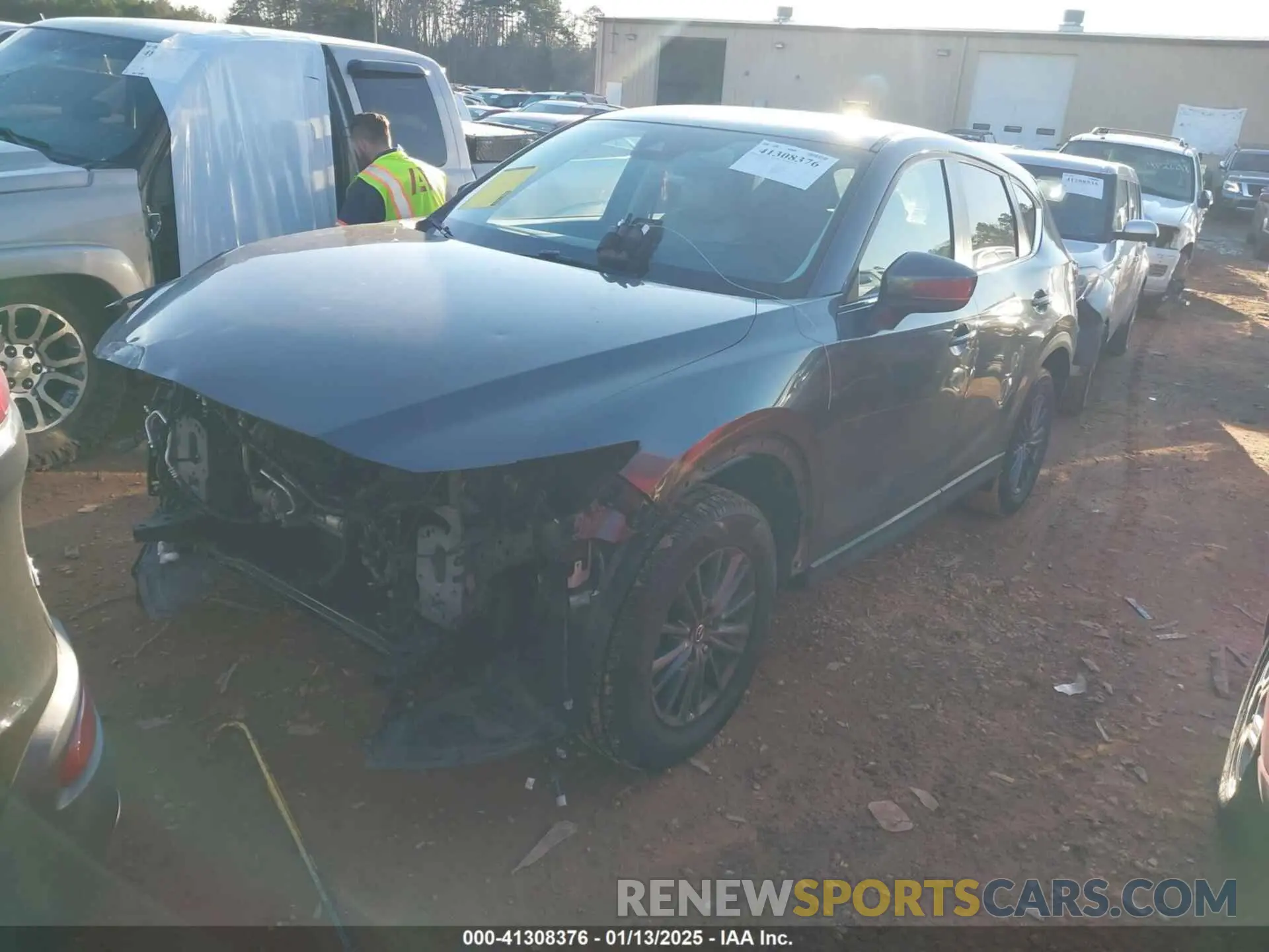 2 fotografías del automóvil dañado JM3KFACM0K0668242 MAZDA CX-5 2019