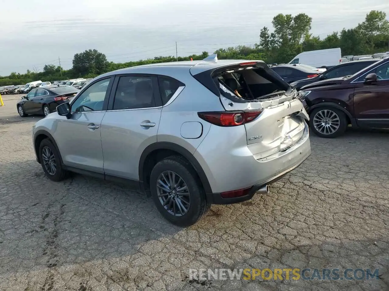 2 fotografías del automóvil dañado JM3KFACM0K1587977 MAZDA CX-5 2019