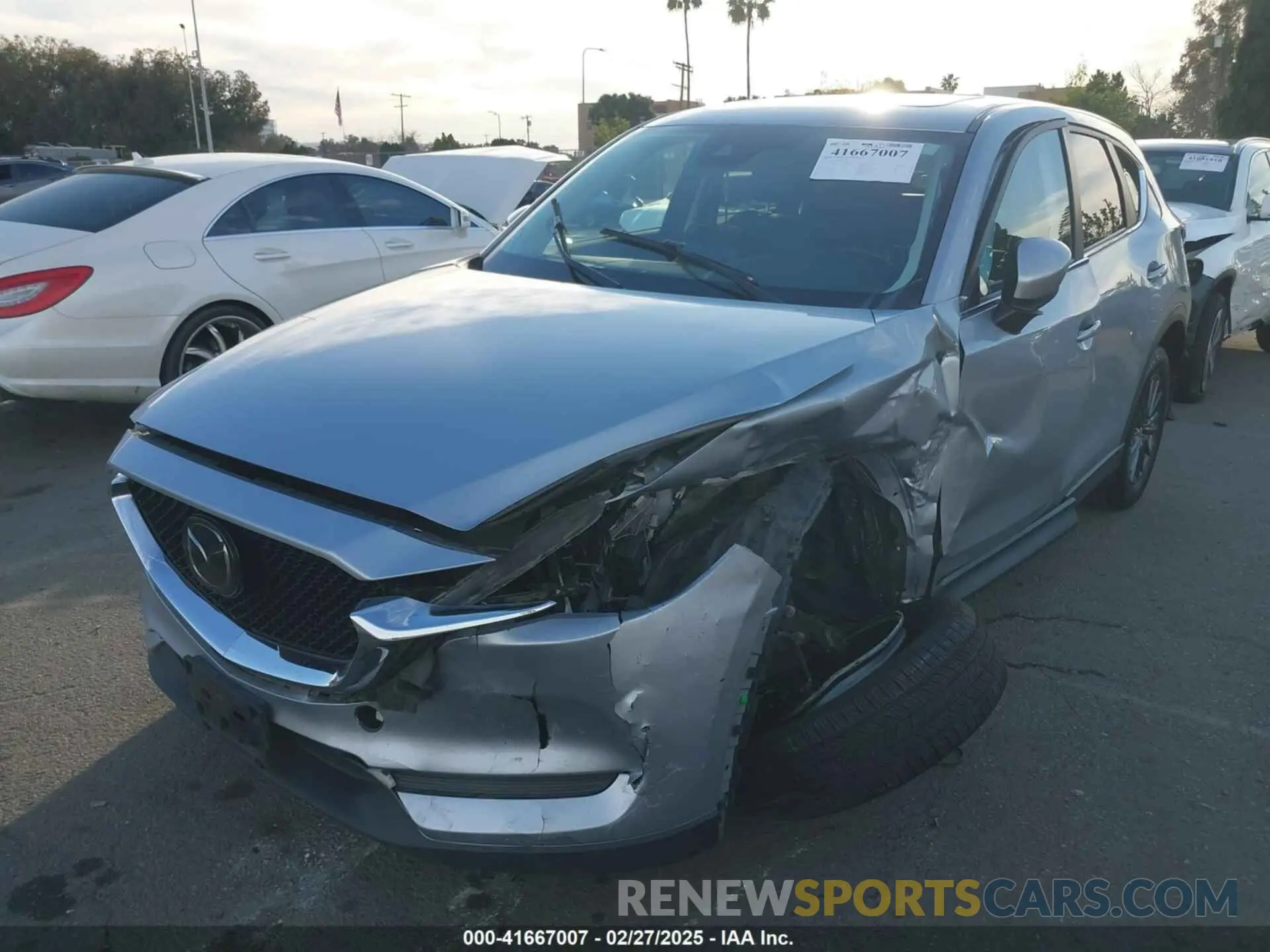 2 fotografías del automóvil dañado JM3KFACM5K1531601 MAZDA CX-5 2019