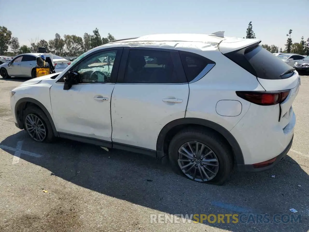 2 fotografías del automóvil dañado JM3KFACM7K0664768 MAZDA CX-5 2019