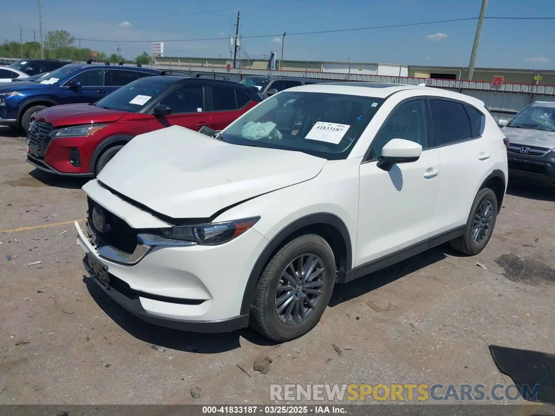 2 fotografías del automóvil dañado JM3KFACM7K1656311 MAZDA CX-5 2019