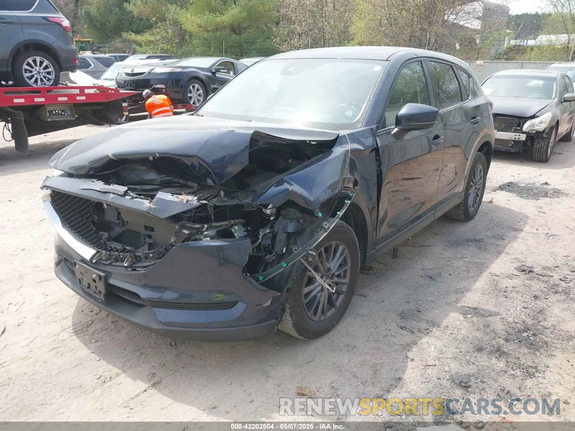 2 fotografías del automóvil dañado JM3KFBCM9K0673753 MAZDA CX-5 2019