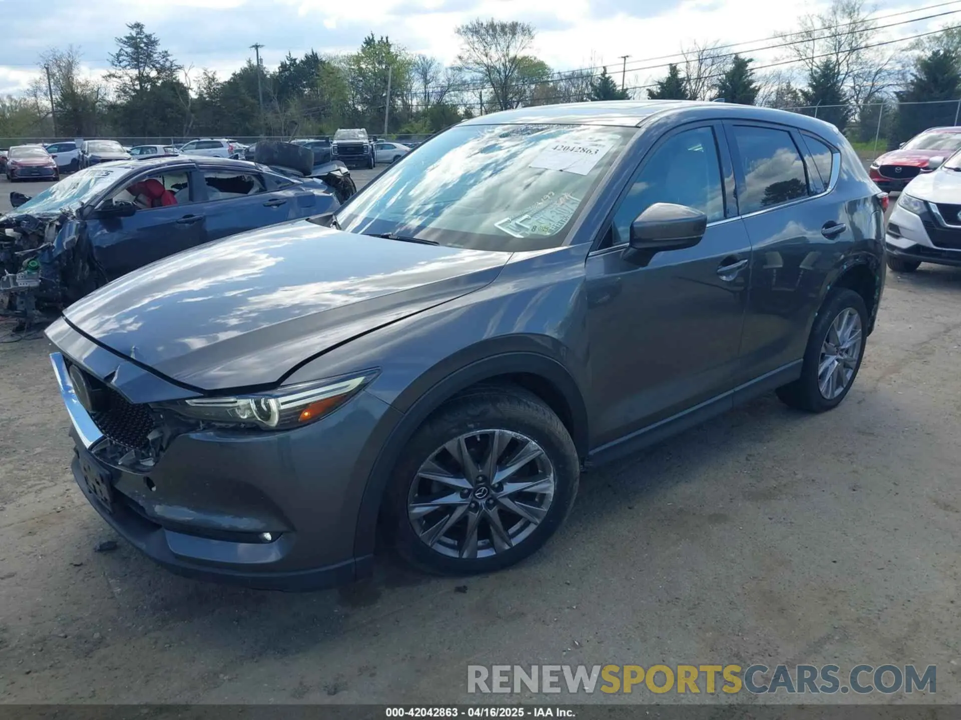 2 fotografías del automóvil dañado JM3KFBDM1K0540001 MAZDA CX-5 2019