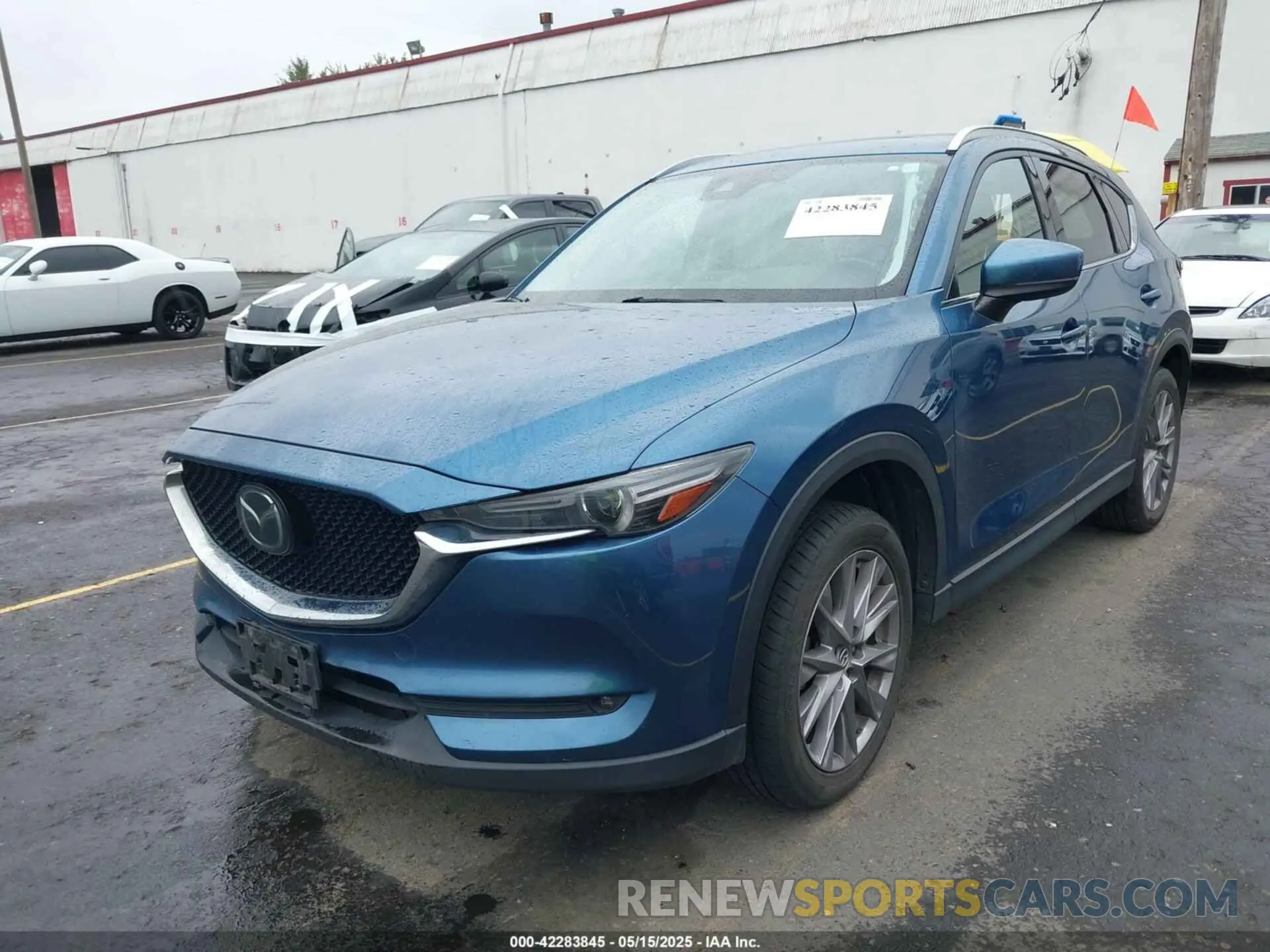 2 fotografías del automóvil dañado JM3KFBDM2K0580930 MAZDA CX-5 2019