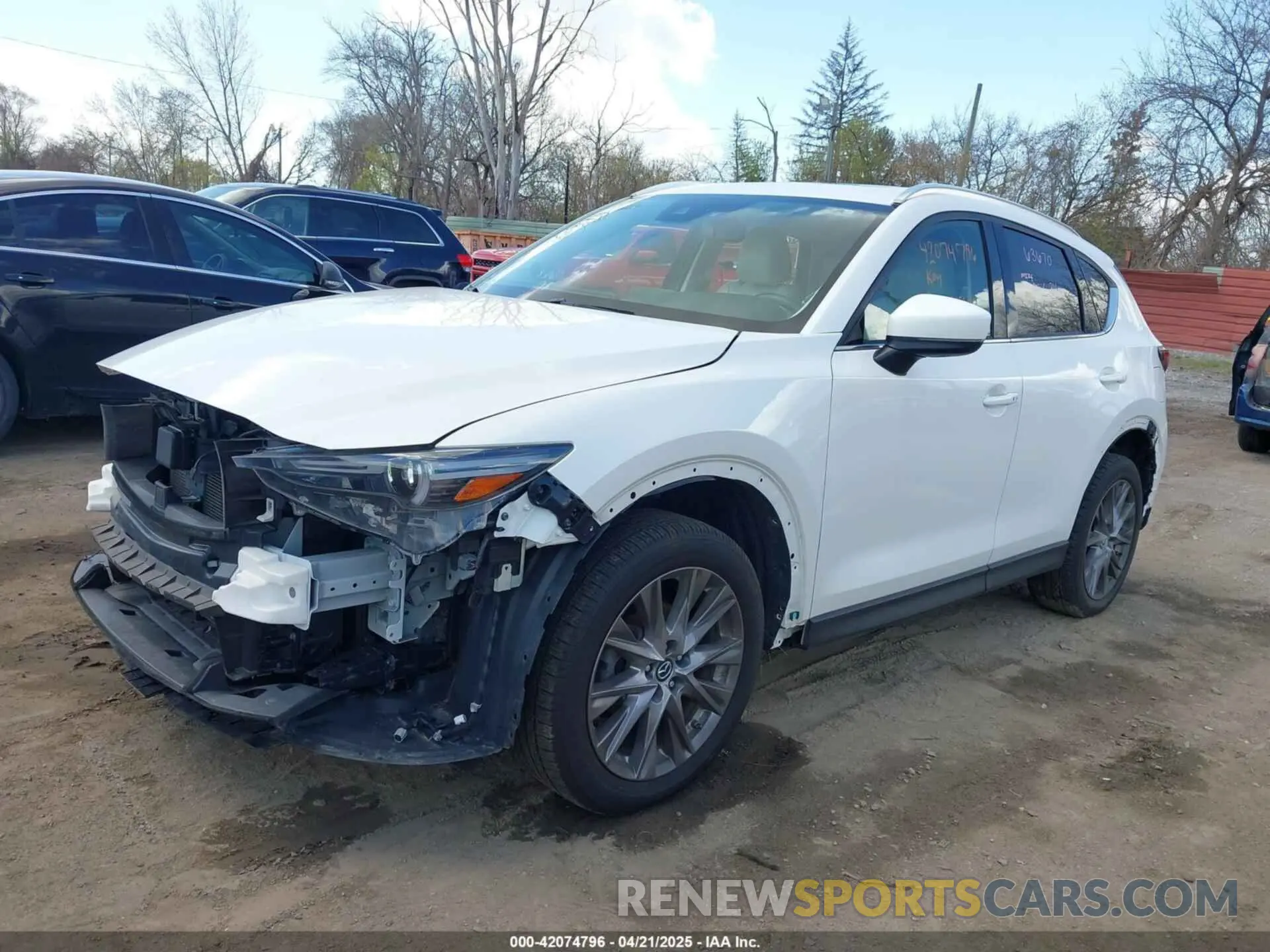2 fotografías del automóvil dañado JM3KFBDM8K1591425 MAZDA CX-5 2019