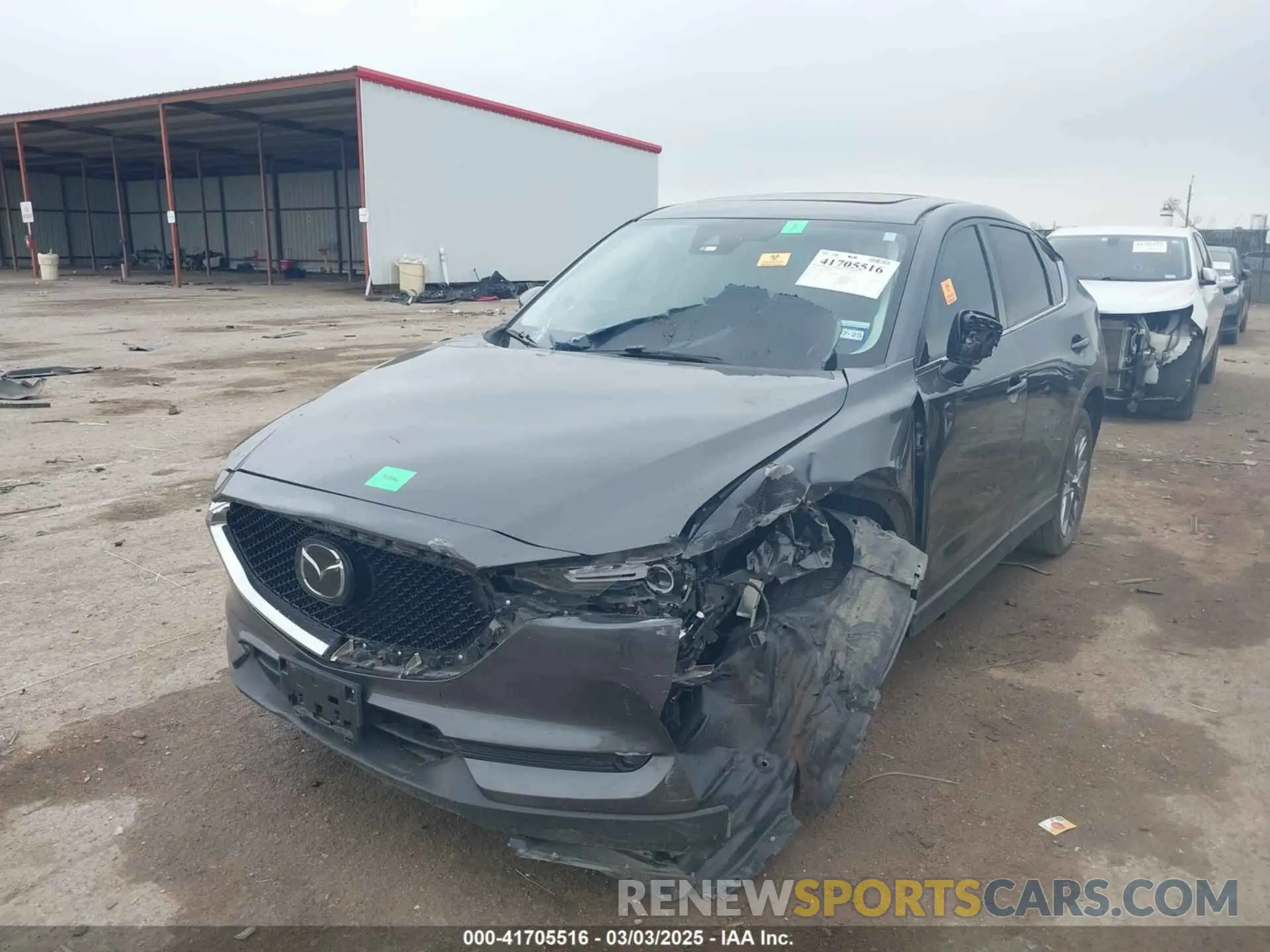 2 fotografías del automóvil dañado JM3KFBDY2K0583264 MAZDA CX-5 2019