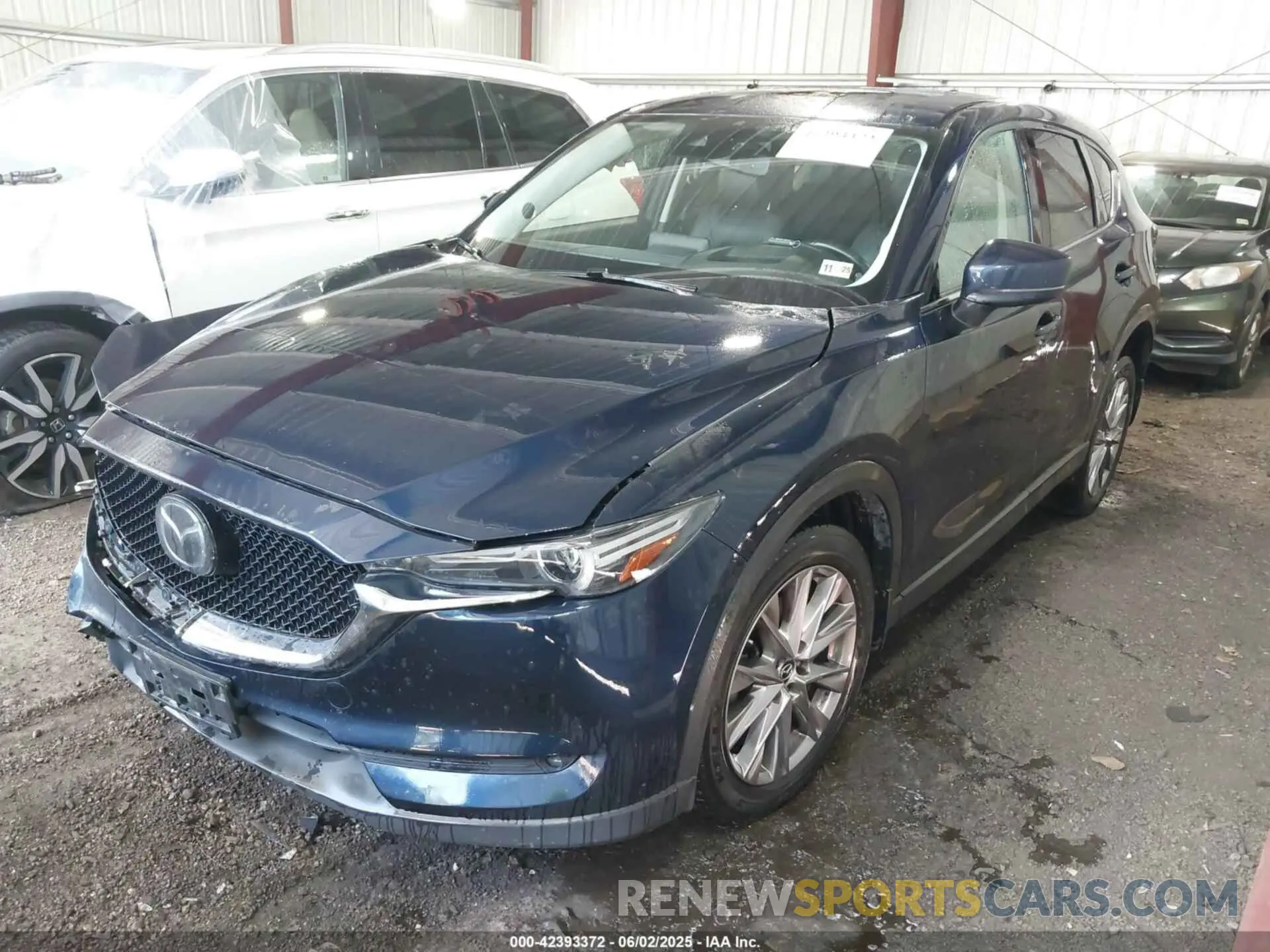 2 fotografías del automóvil dañado JM3KFBDY9K0573301 MAZDA CX-5 2019