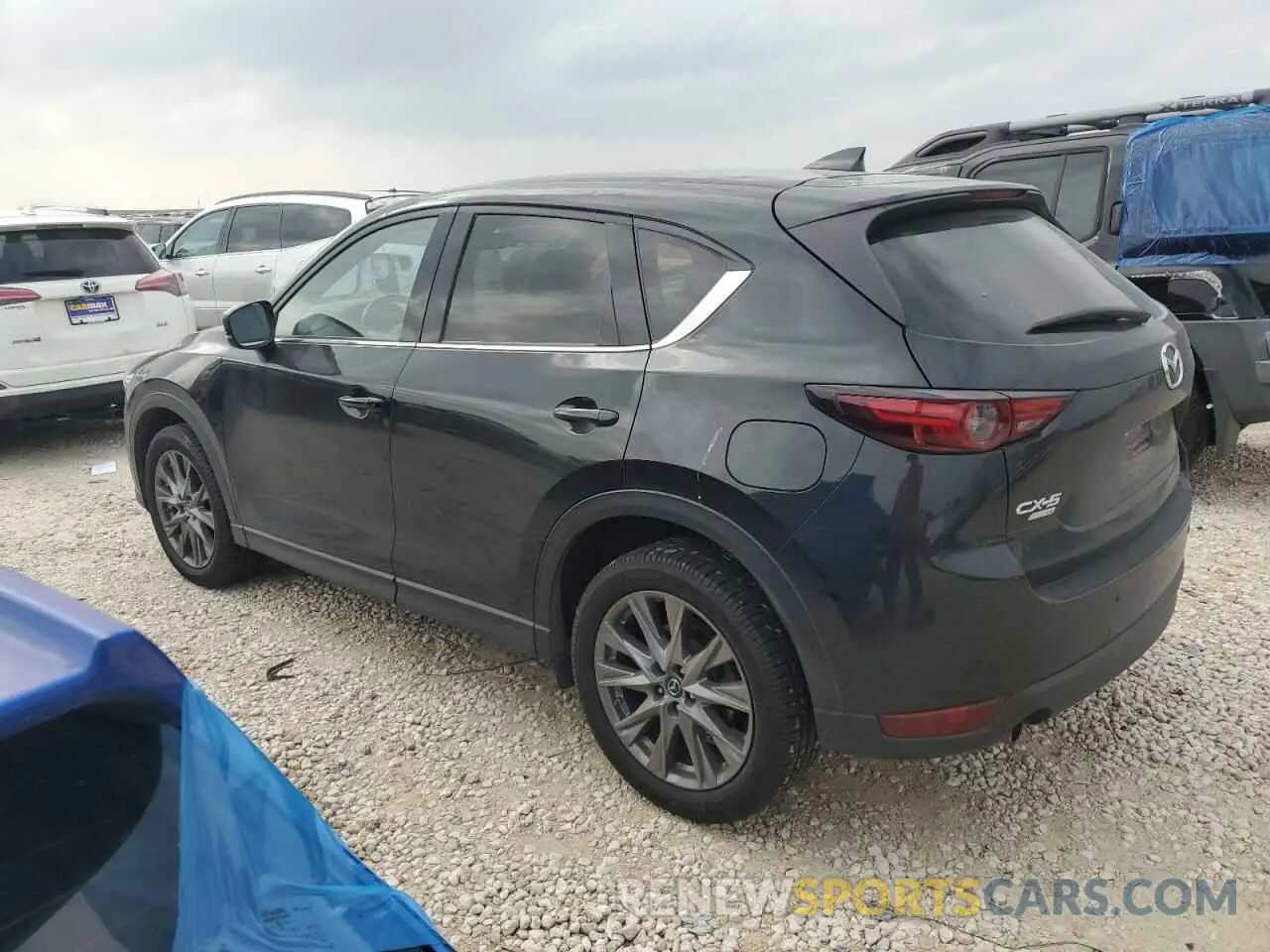 2 fotografías del automóvil dañado JM3KFBEY1K0578653 MAZDA CX-5 2019