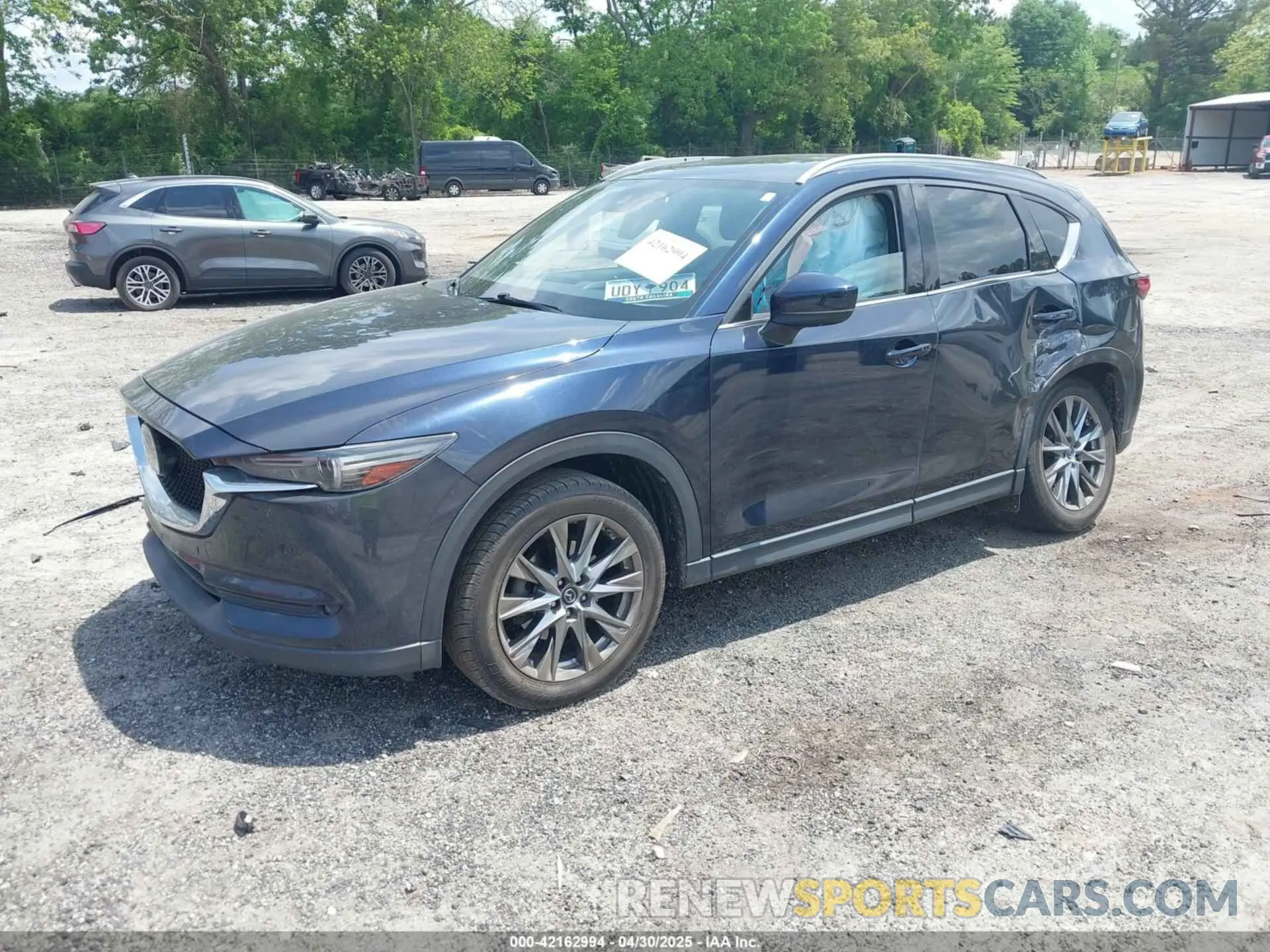 2 fotografías del automóvil dañado JM3KFBEY2K0559982 MAZDA CX-5 2019