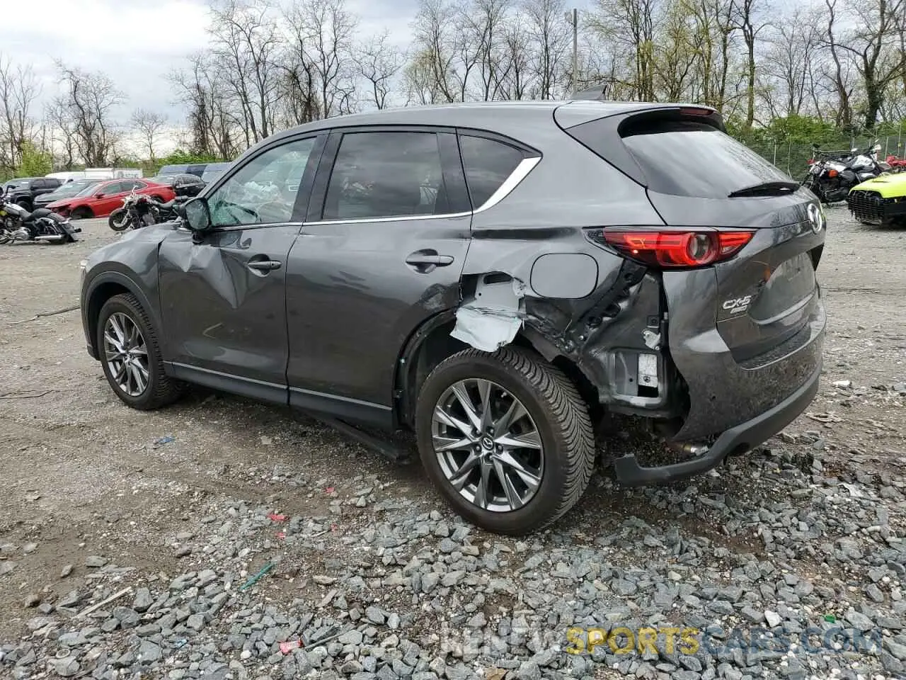 2 fotografías del automóvil dañado JM3KFBEY3K0521581 MAZDA CX-5 2019