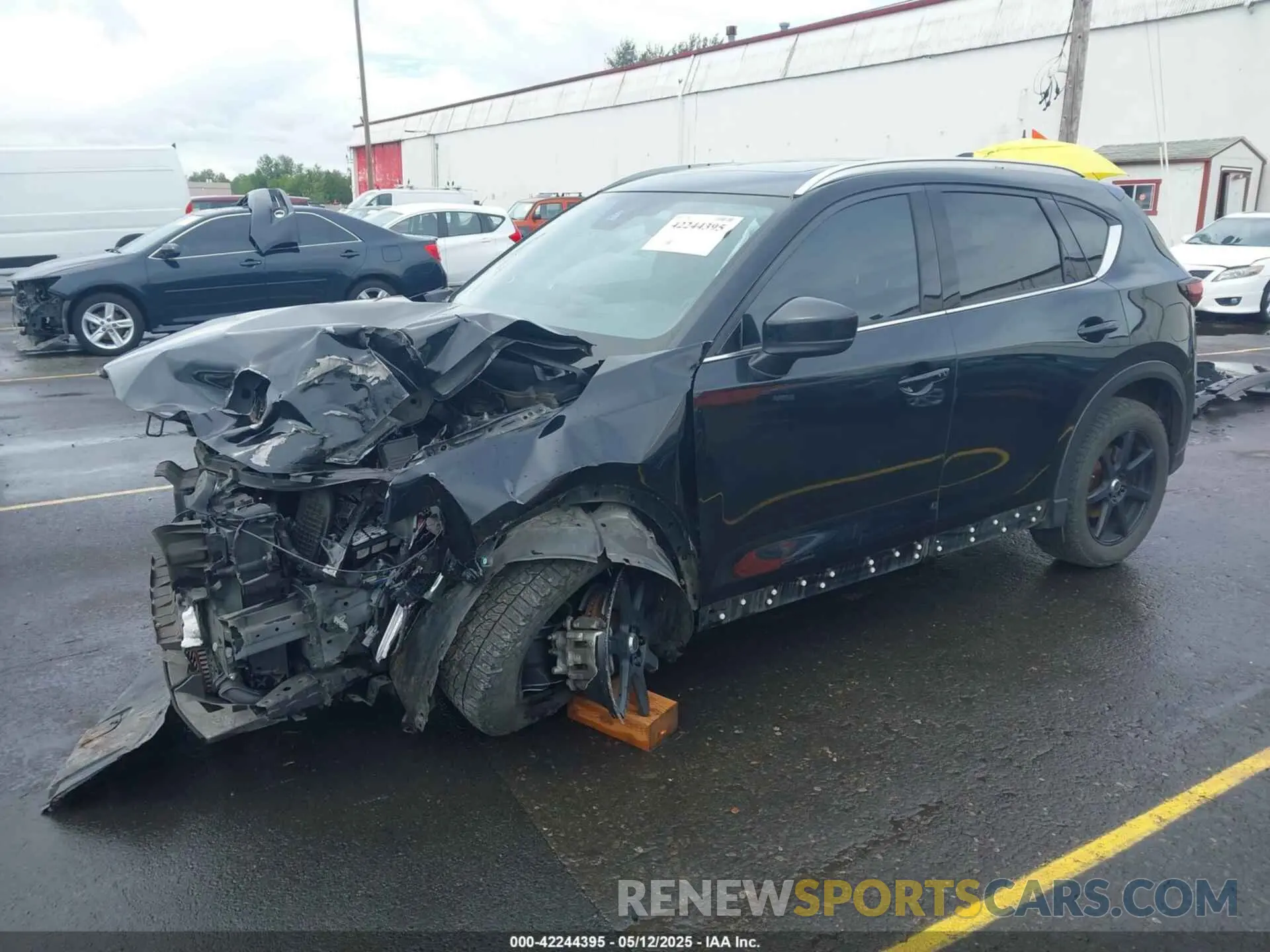 2 fotografías del automóvil dañado JM3KFBEY9K0592039 MAZDA CX-5 2019
