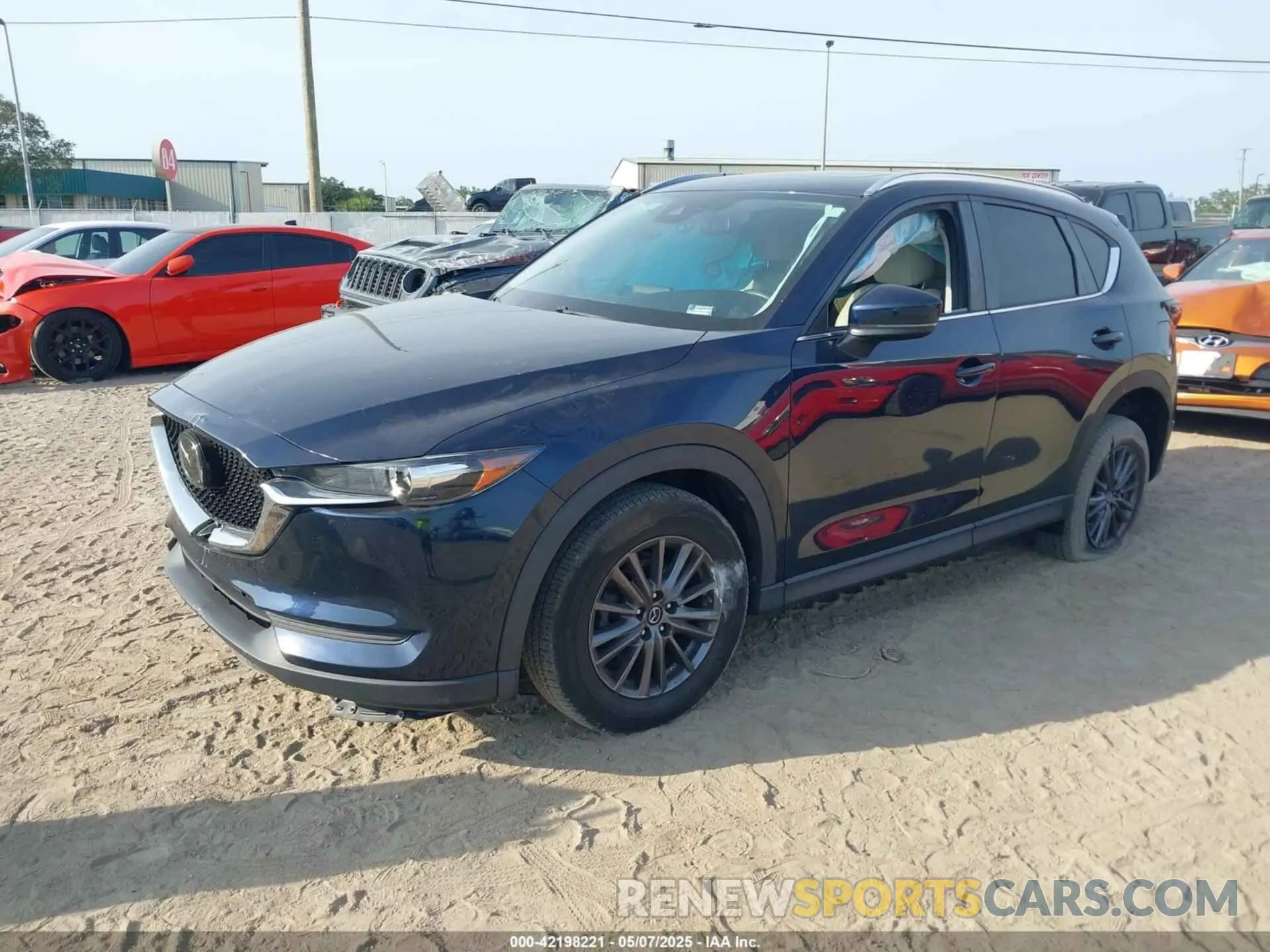2 fotografías del automóvil dañado JM3KFACM1L0832468 MAZDA CX-5 2020