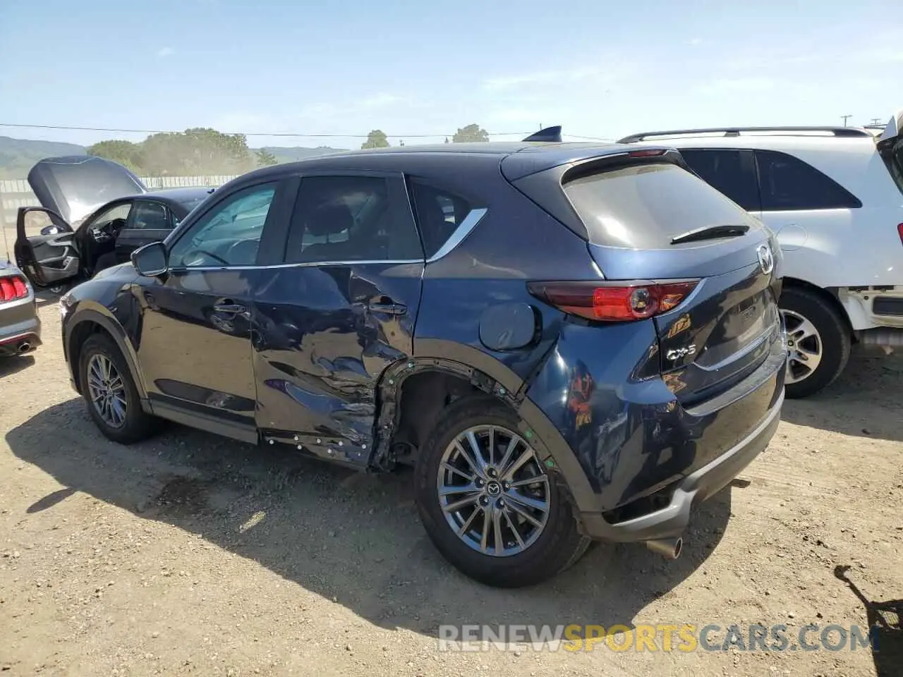 2 fotografías del automóvil dañado JM3KFACM5L0802650 MAZDA CX-5 2020