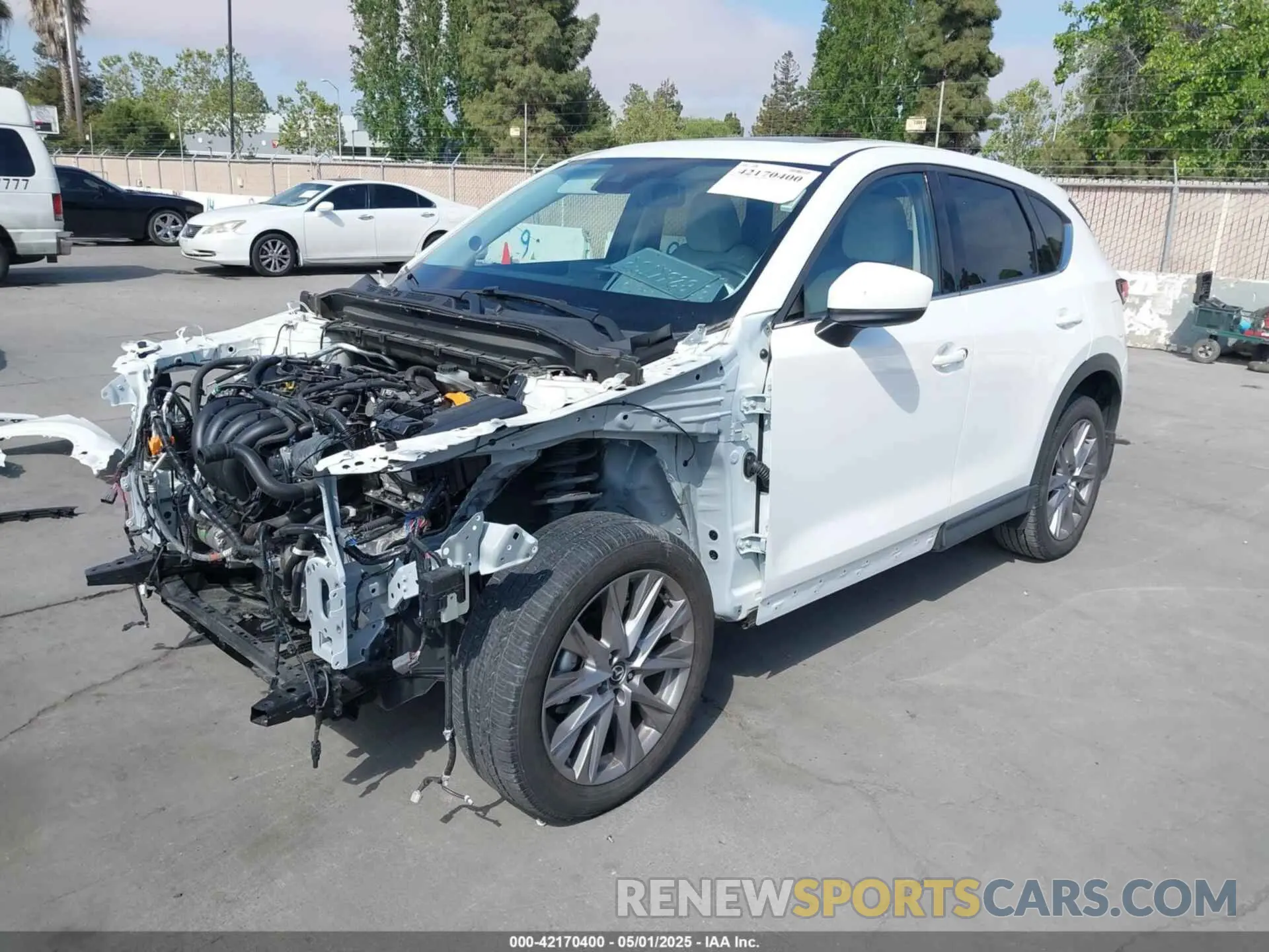 2 fotografías del automóvil dañado JM3KFADM0L0859059 MAZDA CX-5 2020