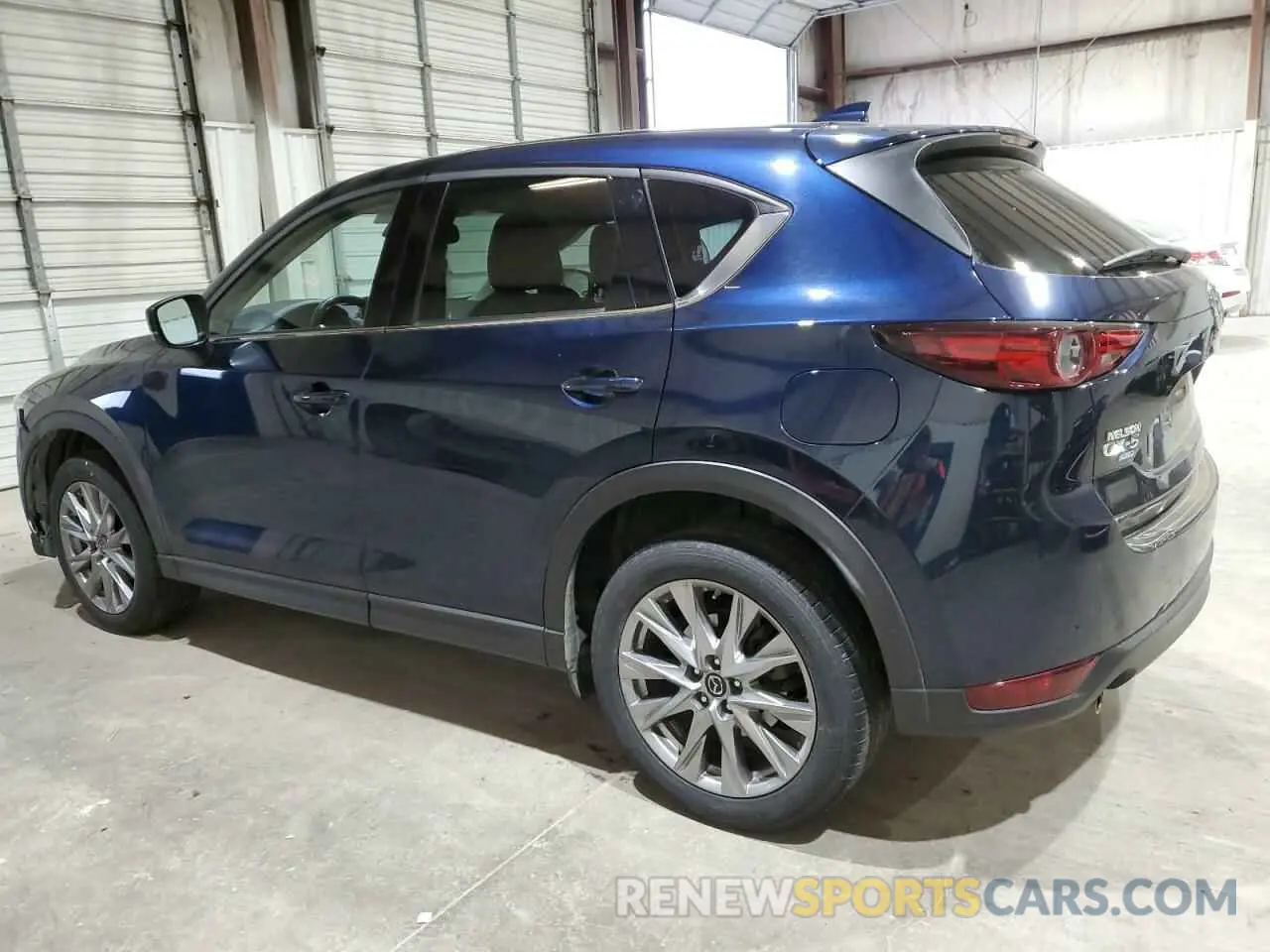 2 fotografías del automóvil dañado JM3KFBDM3L0813652 MAZDA CX-5 2020