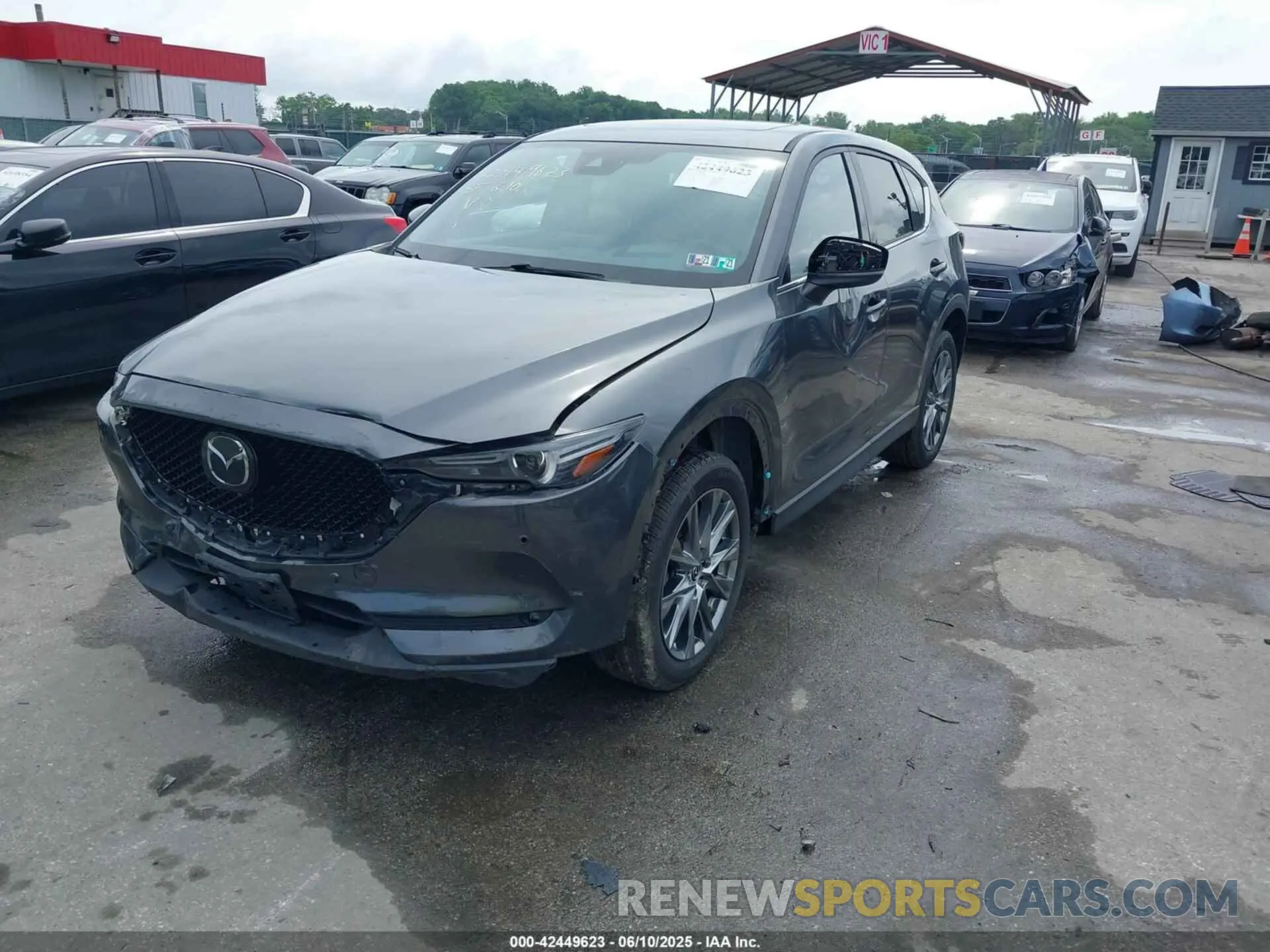 2 fotografías del automóvil dañado JM3KFBEY8L0822963 MAZDA CX-5 2020