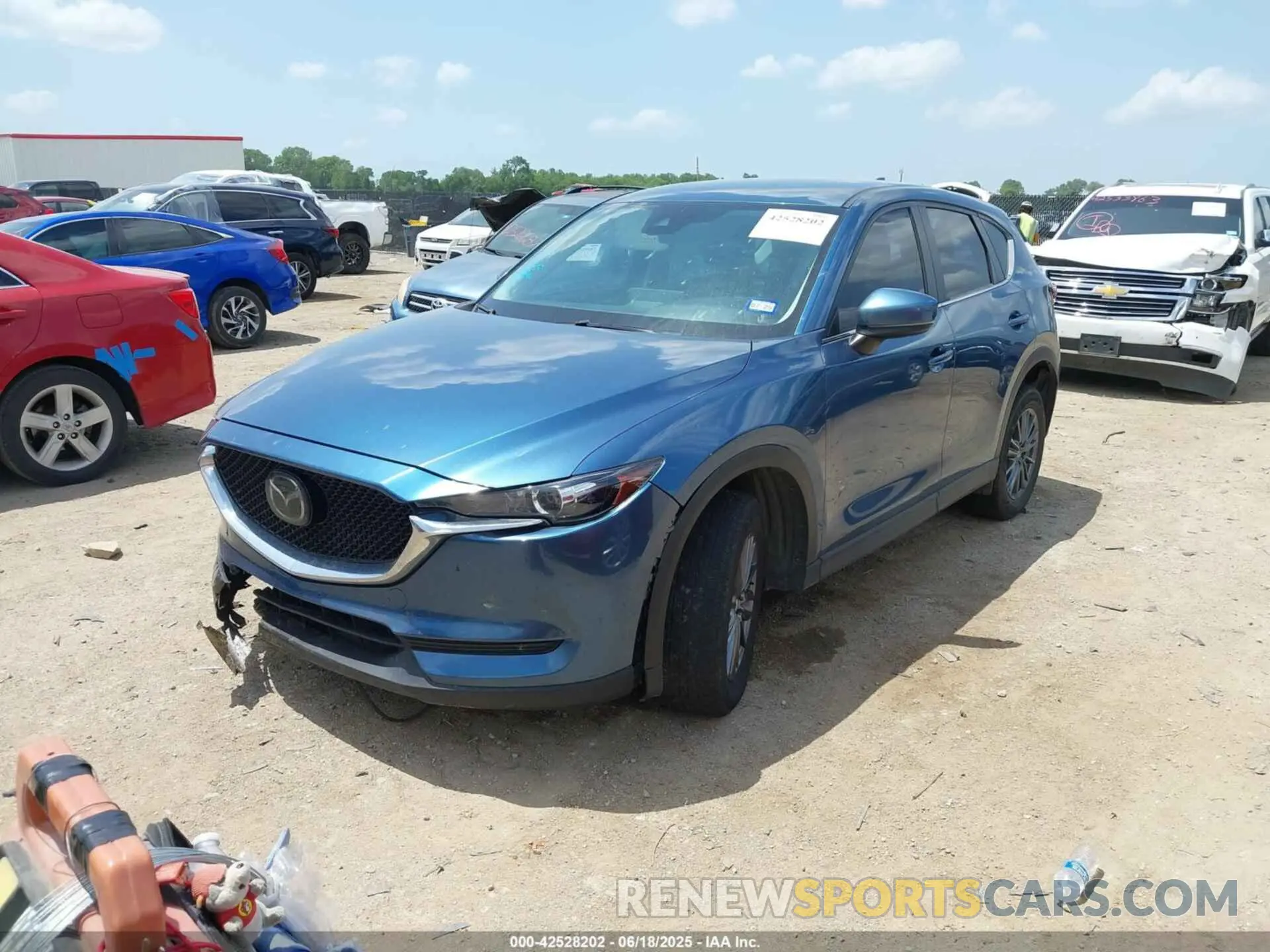 2 fotografías del automóvil dañado JM3KFABM5M1315946 MAZDA CX-5 2021