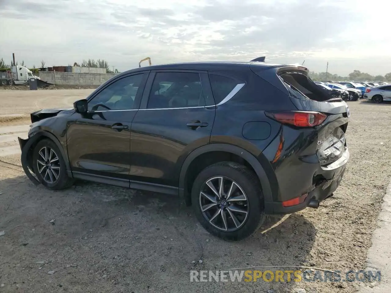 2 fotografías del automóvil dañado JM3KFABM9M0301909 MAZDA CX-5 2021