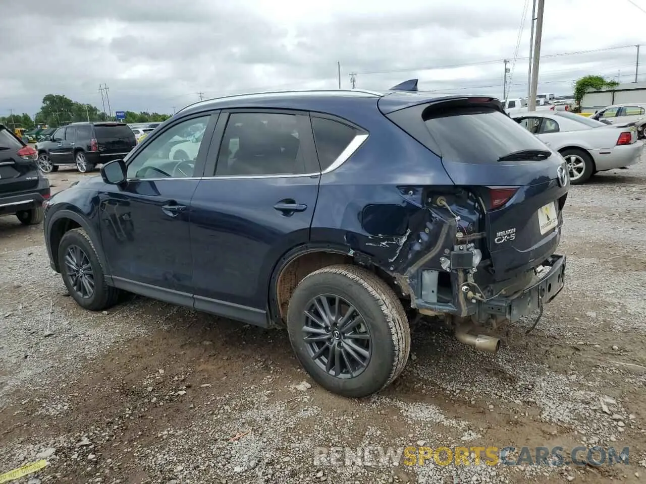 2 fotografías del automóvil dañado JM3KFACM0M0397721 MAZDA CX-5 2021