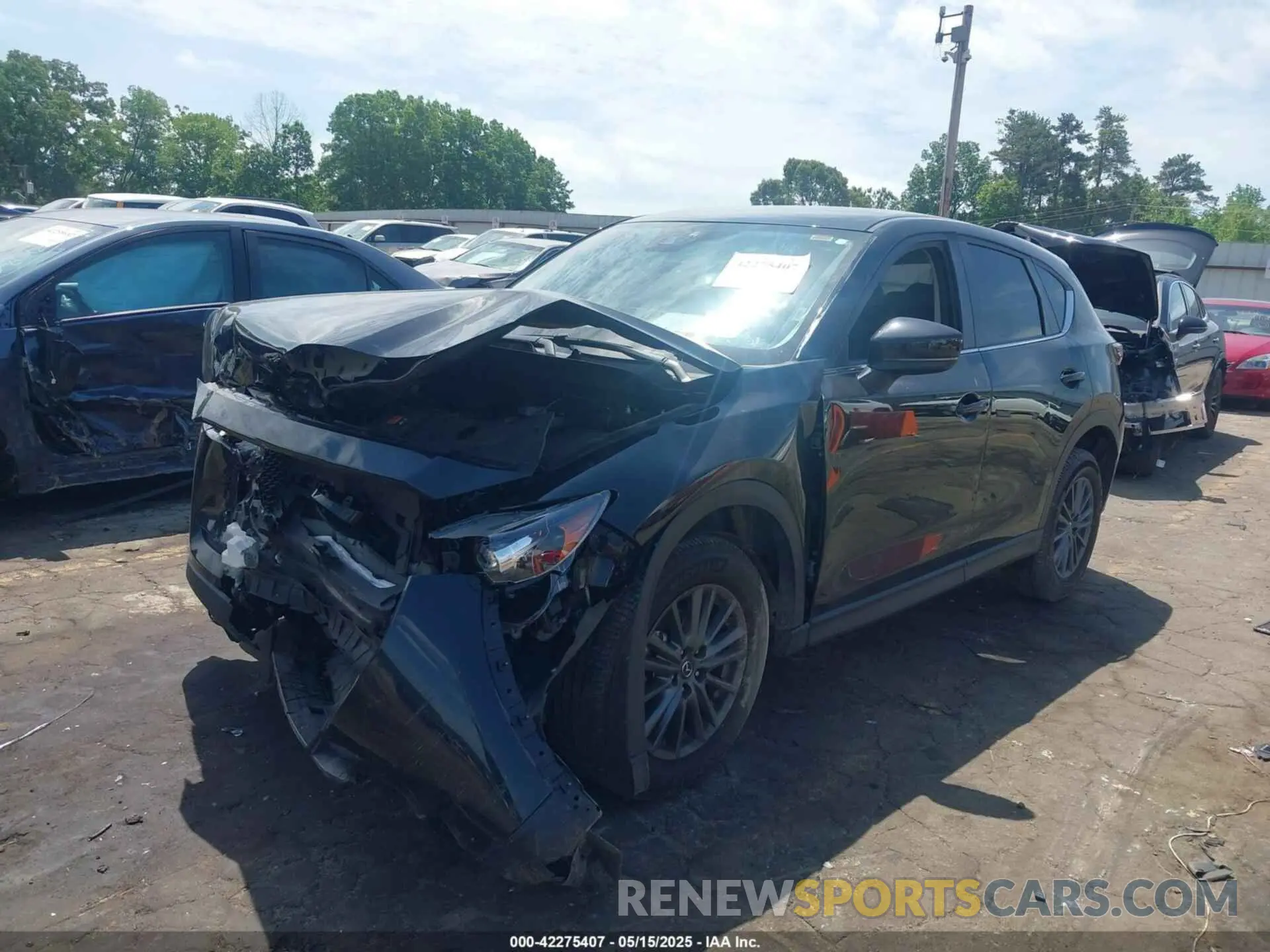 2 fotografías del automóvil dañado JM3KFACM4M0328949 MAZDA CX-5 2021