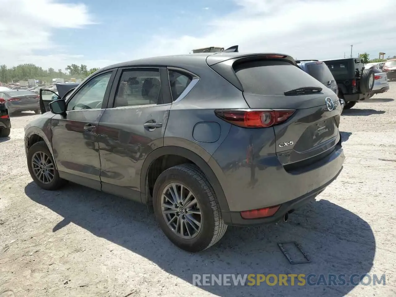2 fotografías del automóvil dañado JM3KFACM4M0341183 MAZDA CX-5 2021