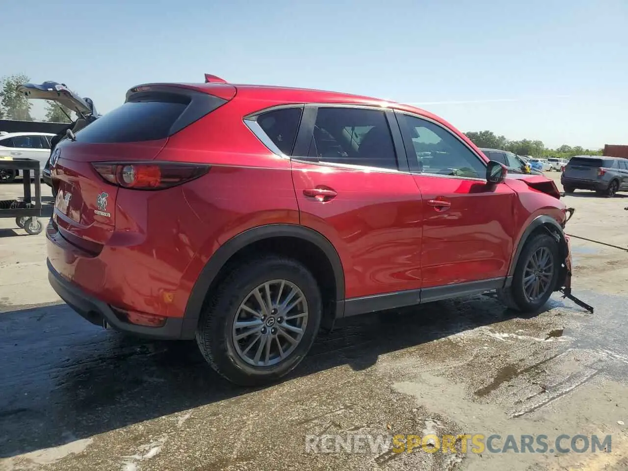 3 fotografías del automóvil dañado JM3KFACM6M0330878 MAZDA CX-5 2021