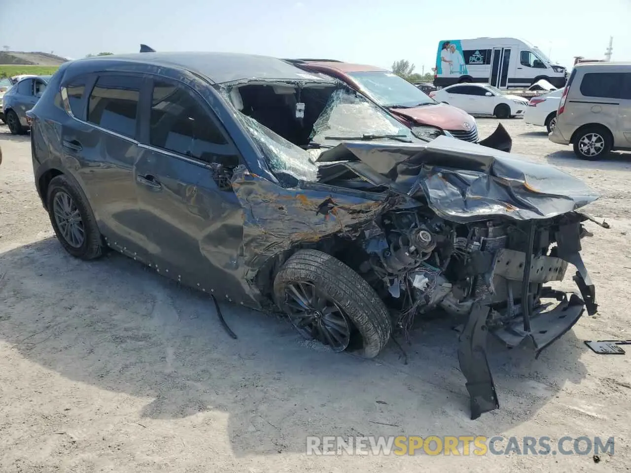 4 fotografías del automóvil dañado JM3KFACM7M0372444 MAZDA CX-5 2021