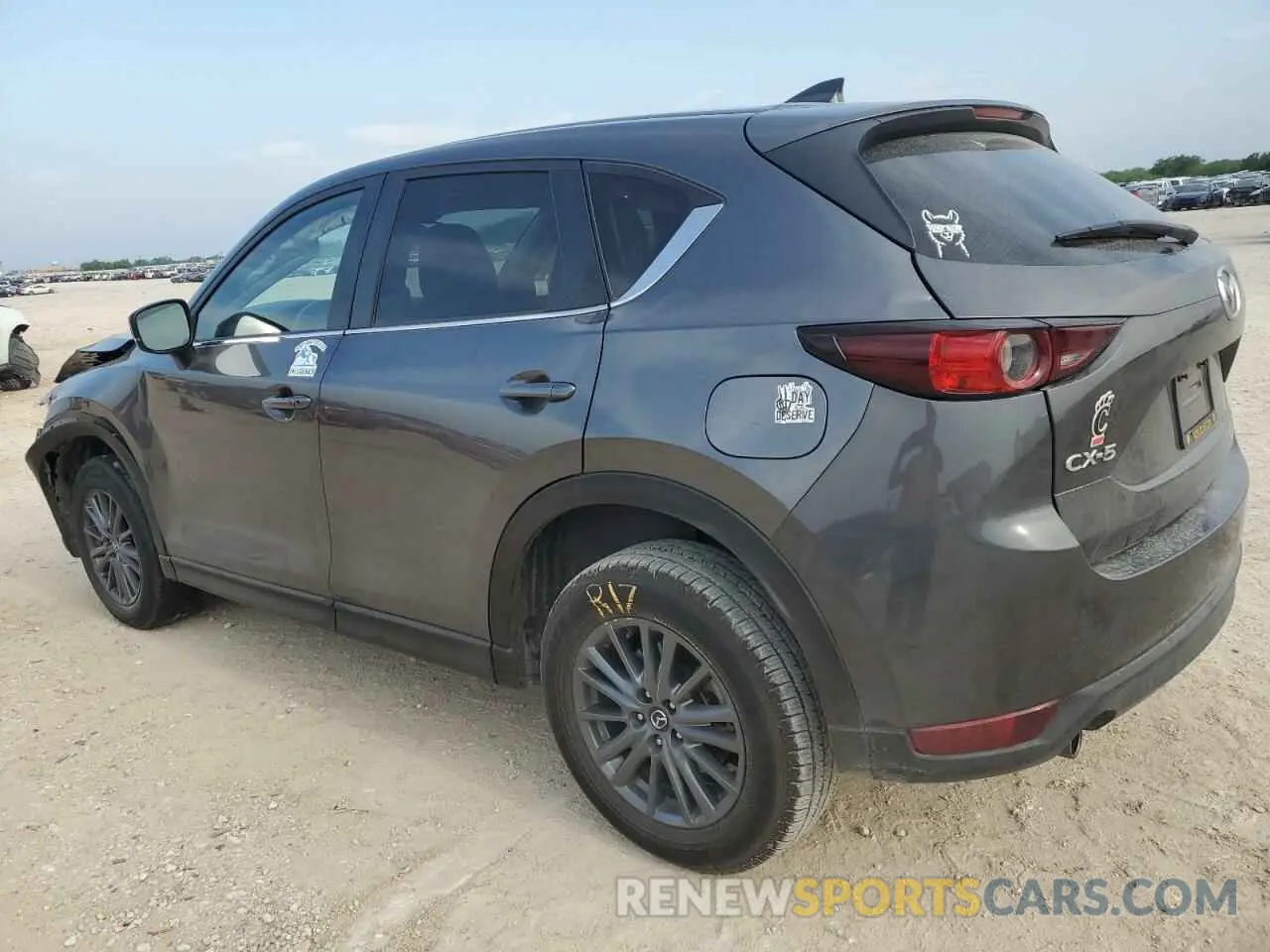 2 fotografías del automóvil dañado JM3KFACM7M1390100 MAZDA CX-5 2021