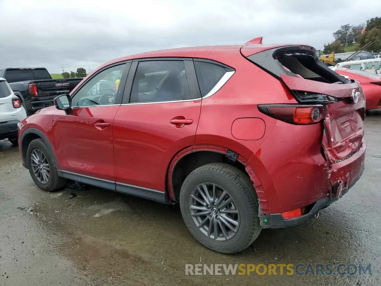 2 fotografías del automóvil dañado JM3KFACM8M0406987 MAZDA CX-5 2021